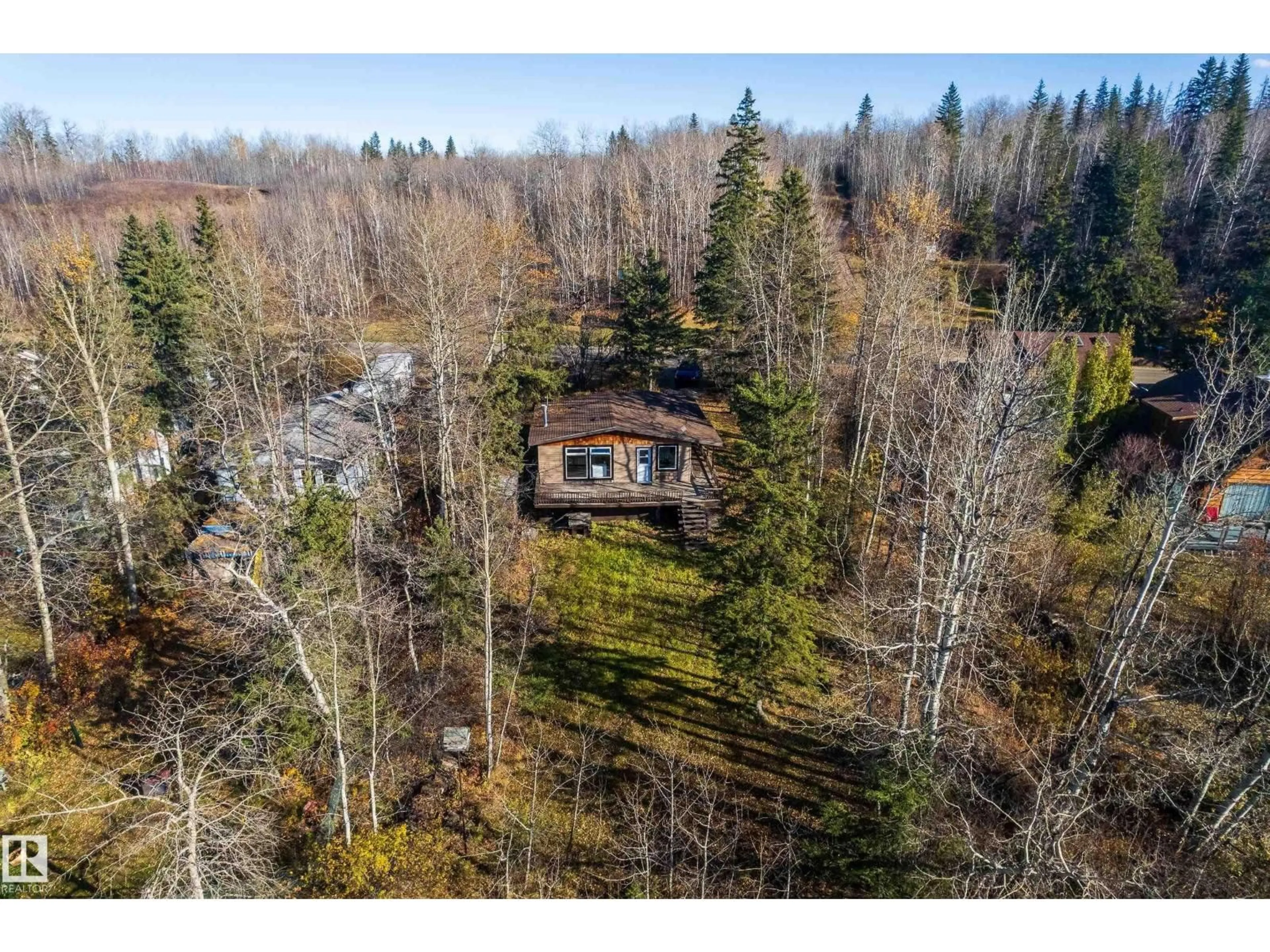A pic from outside/outdoor area/front of a property/back of a property/a pic from drone, forest/trees view for 161 LAKESHORE DR, Rural Lac Ste. Anne County Alberta T0E1V0