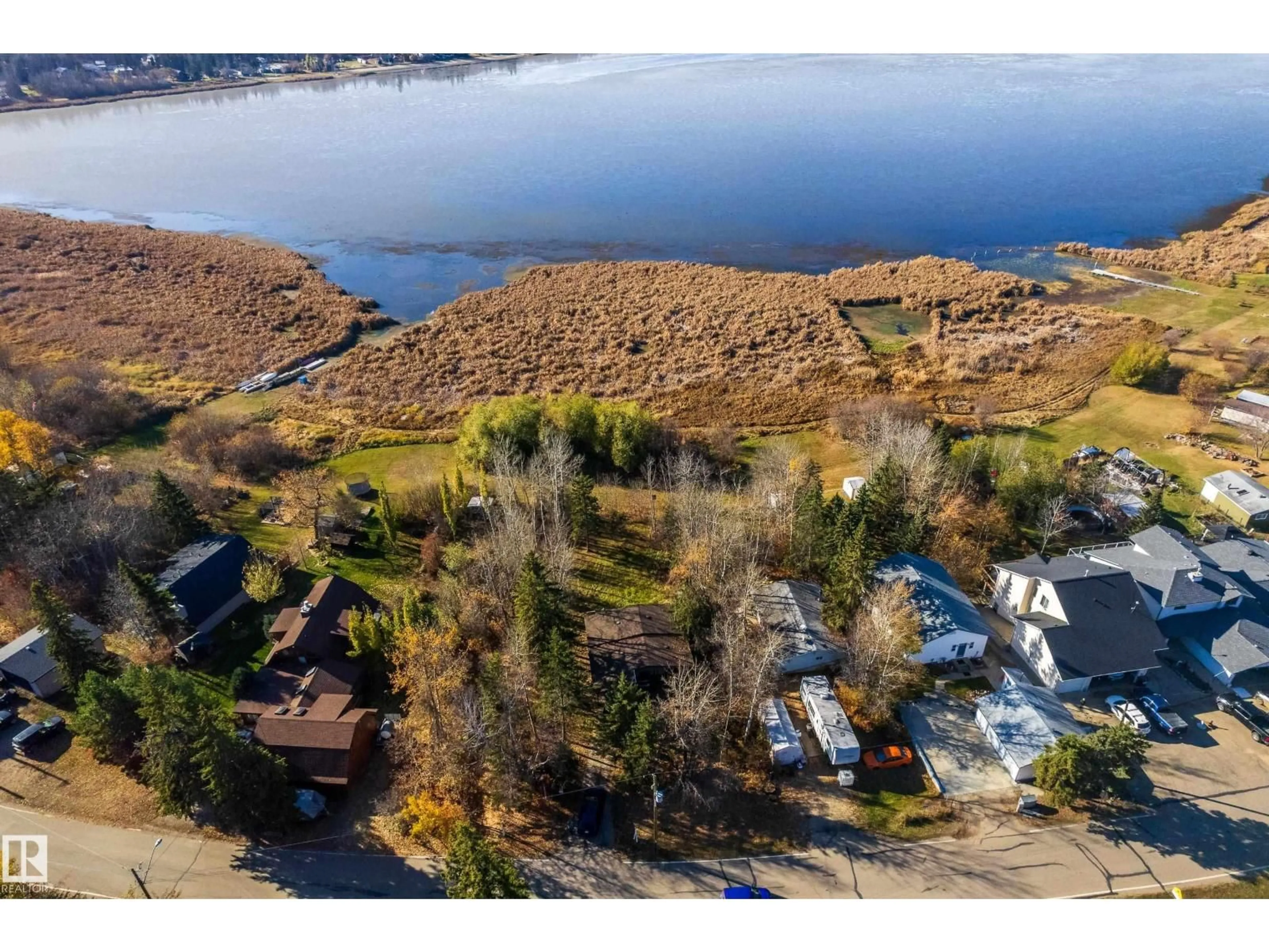 A pic from outside/outdoor area/front of a property/back of a property/a pic from drone, water/lake/river/ocean view for 161 LAKESHORE DR, Rural Lac Ste. Anne County Alberta T0E1V0