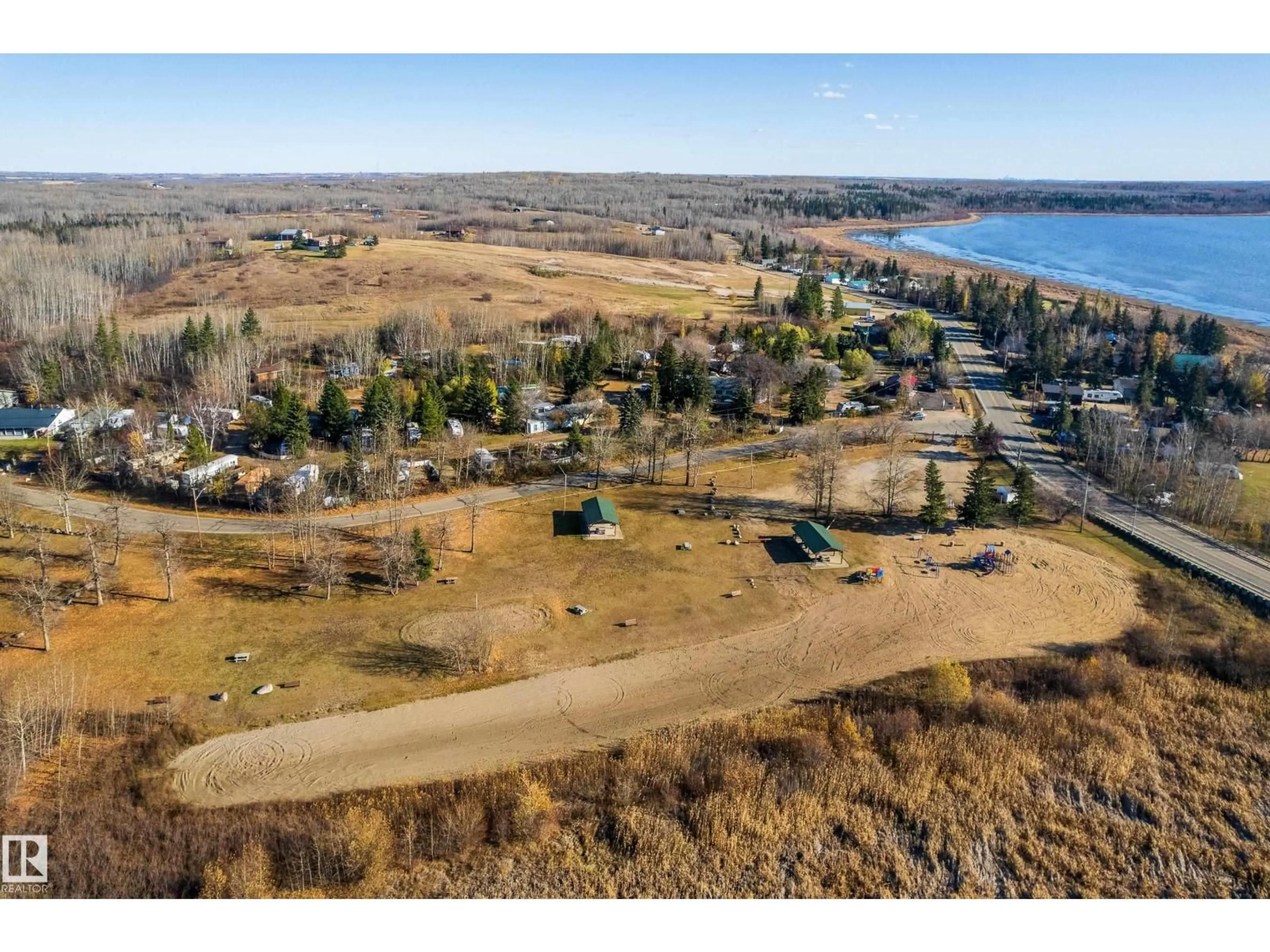 A pic from outside/outdoor area/front of a property/back of a property/a pic from drone, water/lake/river/ocean view for 161 LAKESHORE DR, Rural Lac Ste. Anne County Alberta T0E1V0