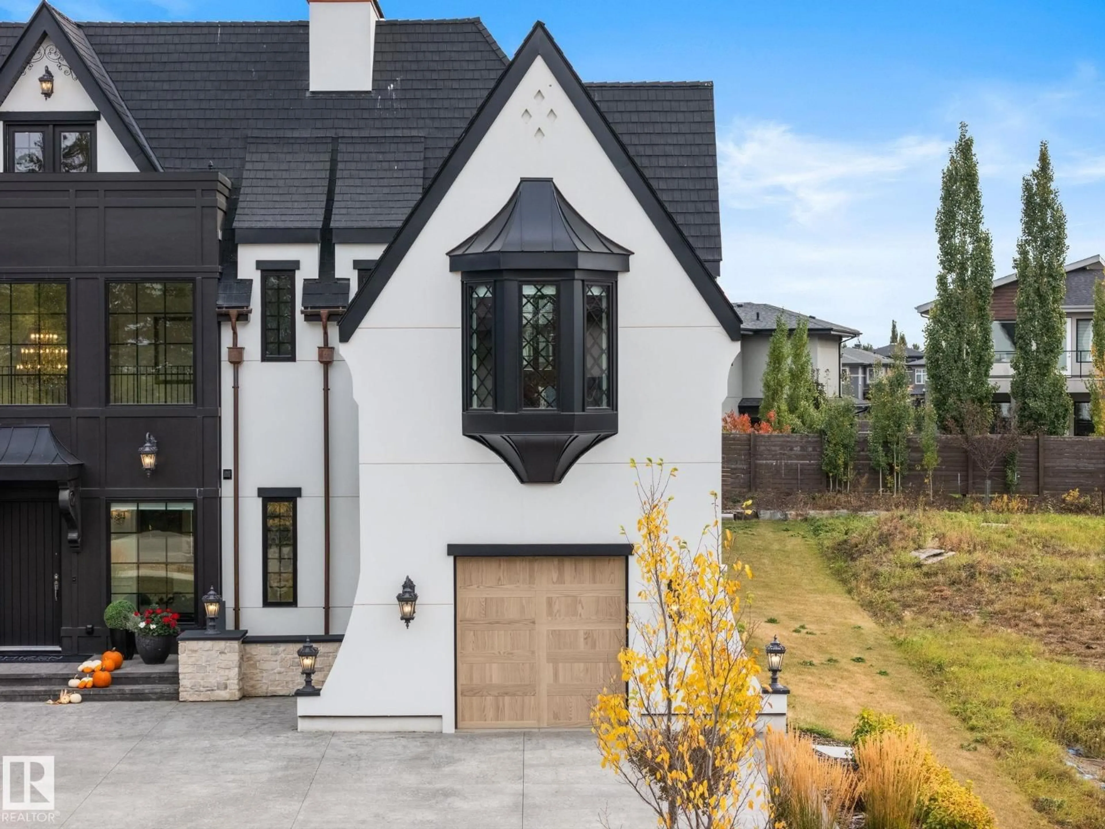Home with brick exterior material, mountain view for 183 WINDERMERE DR, Edmonton Alberta T6W0S4