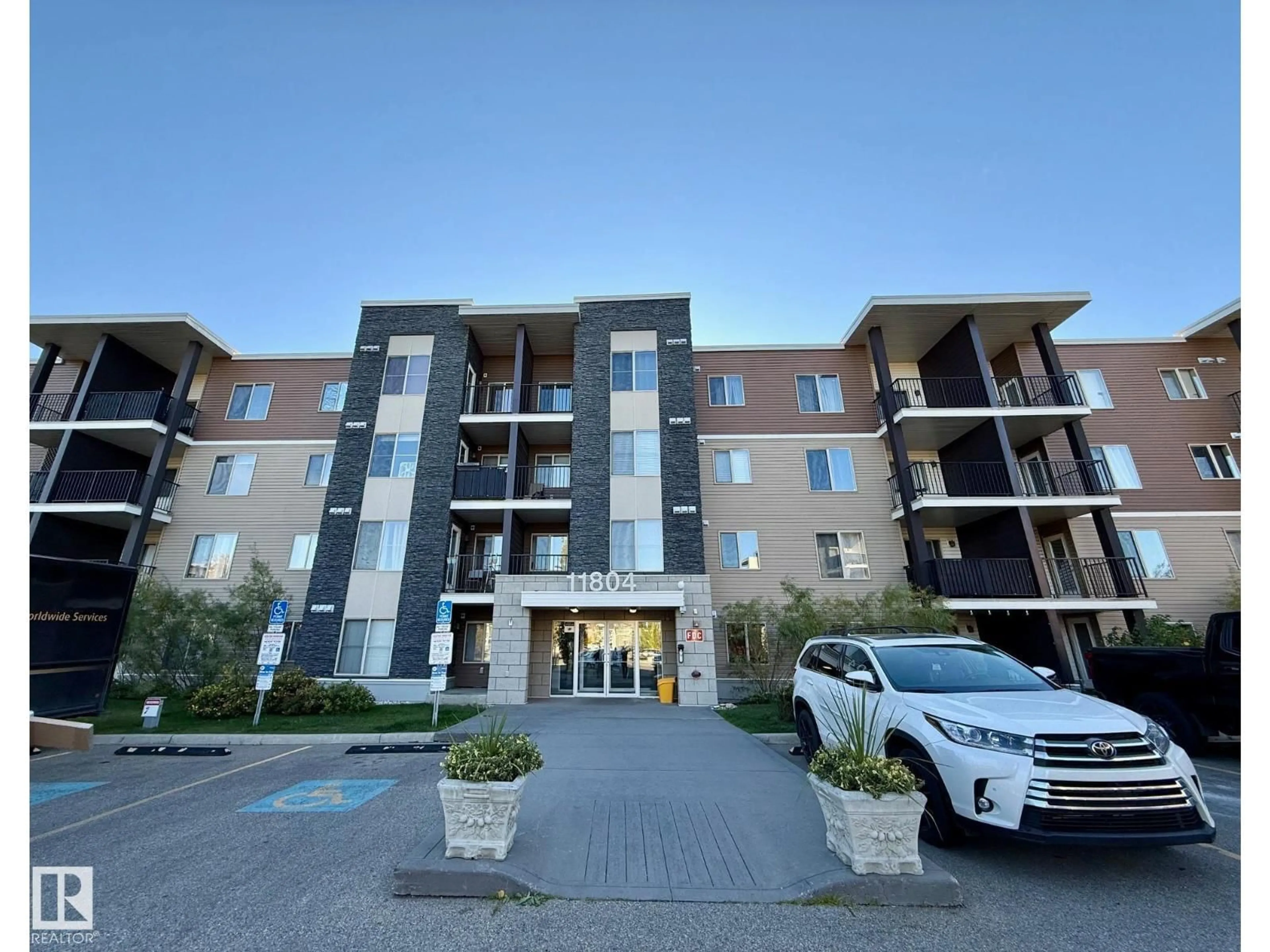 A pic from outside/outdoor area/front of a property/back of a property/a pic from drone, building for #402 - 11804 22 AV, Edmonton Alberta T6W2A2