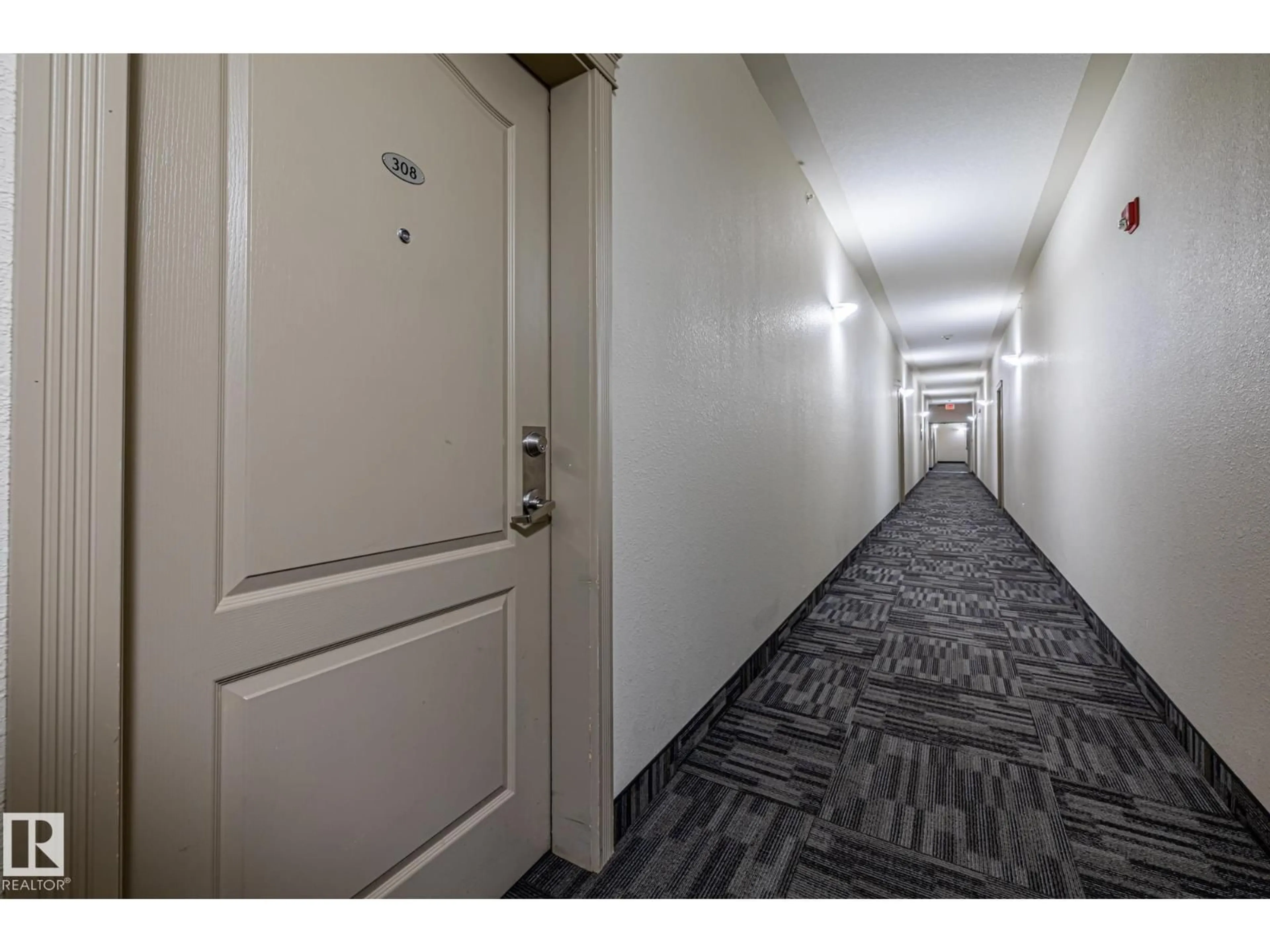 Indoor foyer for #308 - 12550 140 AV, Edmonton Alberta T5X6J4