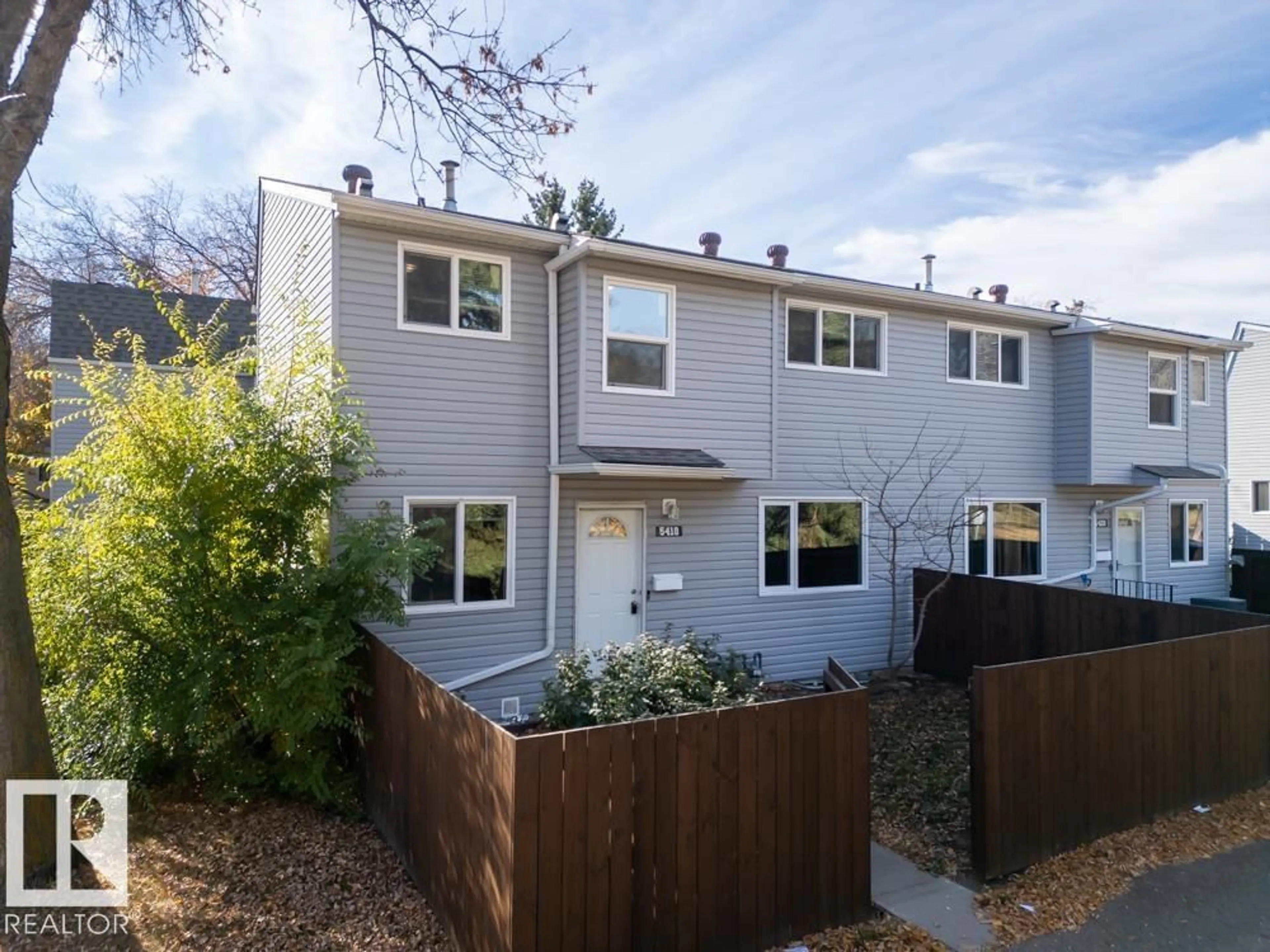 Home with vinyl exterior material, street for NW - 5418 144B AV, Edmonton Alberta T5A3N3