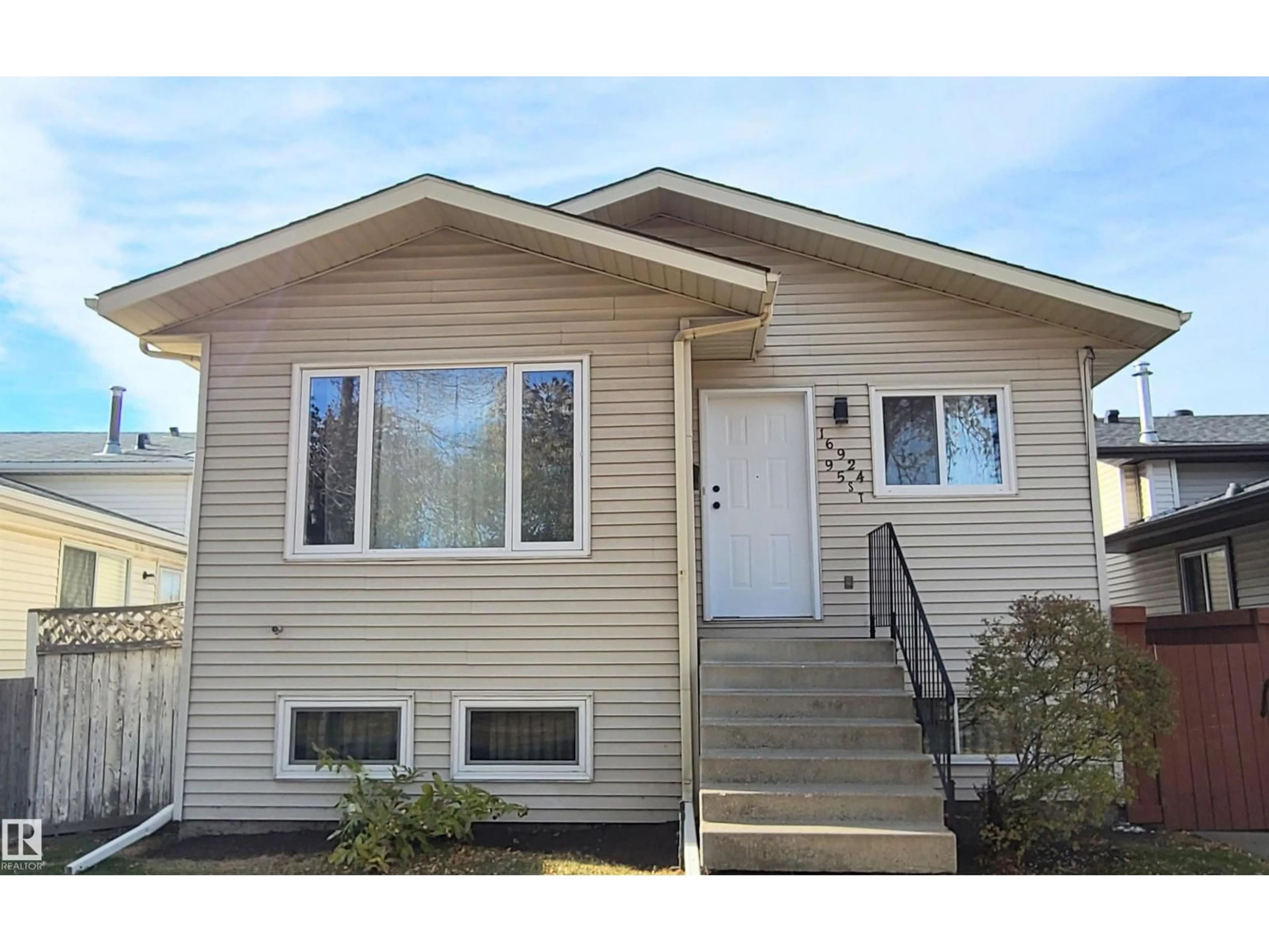 Home with vinyl exterior material, street for NW - 16924 95 ST, Edmonton Alberta T5T1Z1