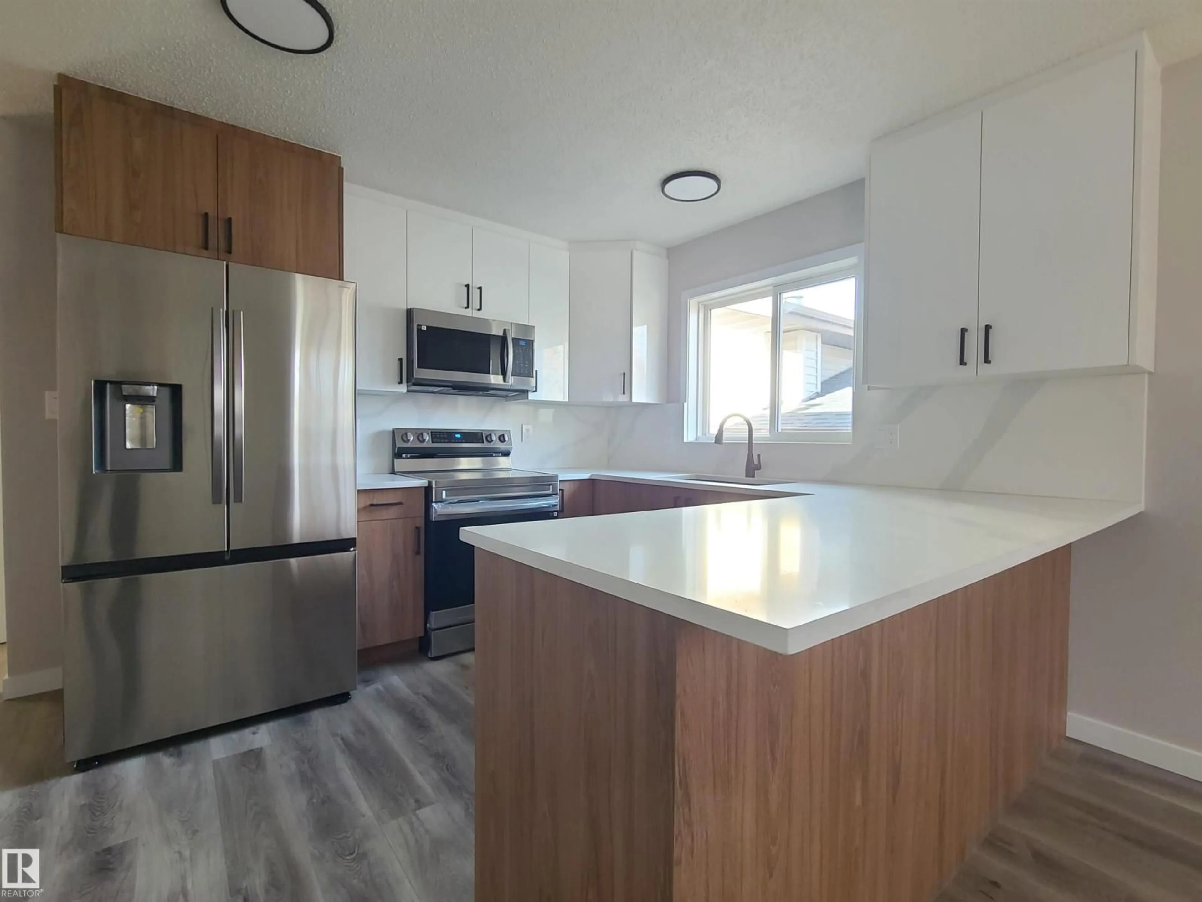 Open concept kitchen, unknown for NW - 16924 95 ST, Edmonton Alberta T5T1Z1