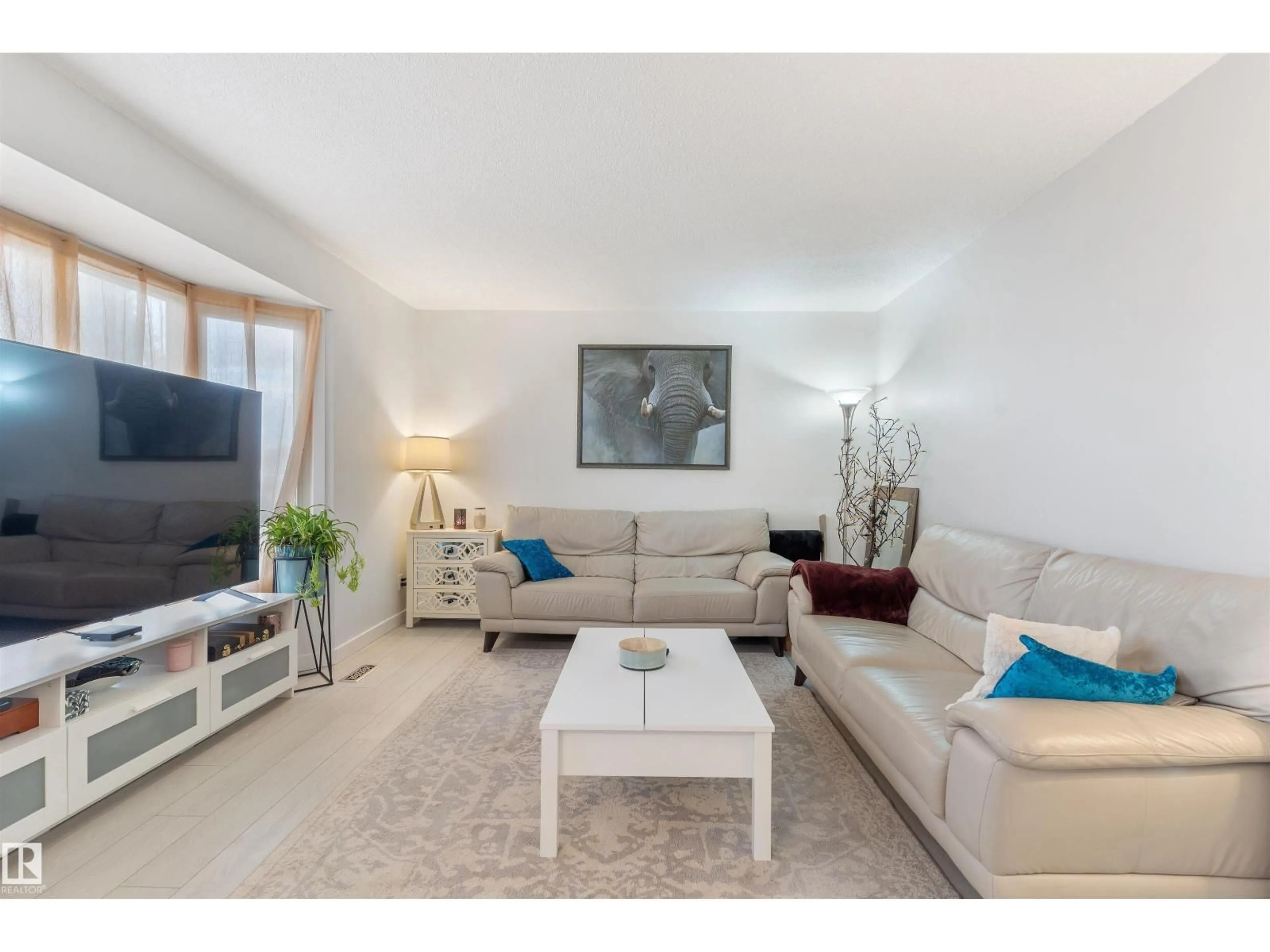 Living room with furniture, unknown for 5614 48A ST, Vegreville Alberta T9C1G7