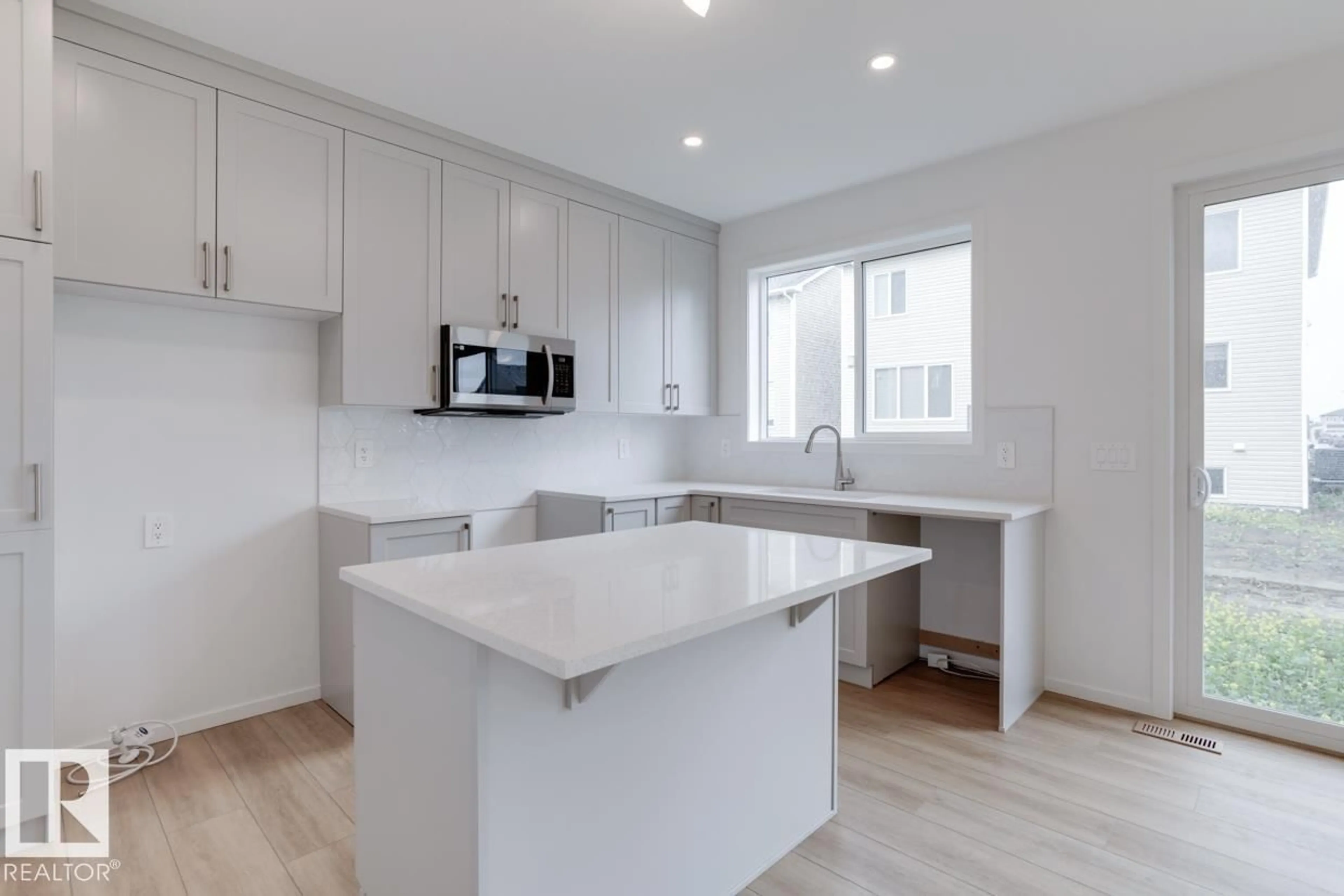 Open concept kitchen, unknown for 20425 16A AV, Edmonton Alberta T6M2P5