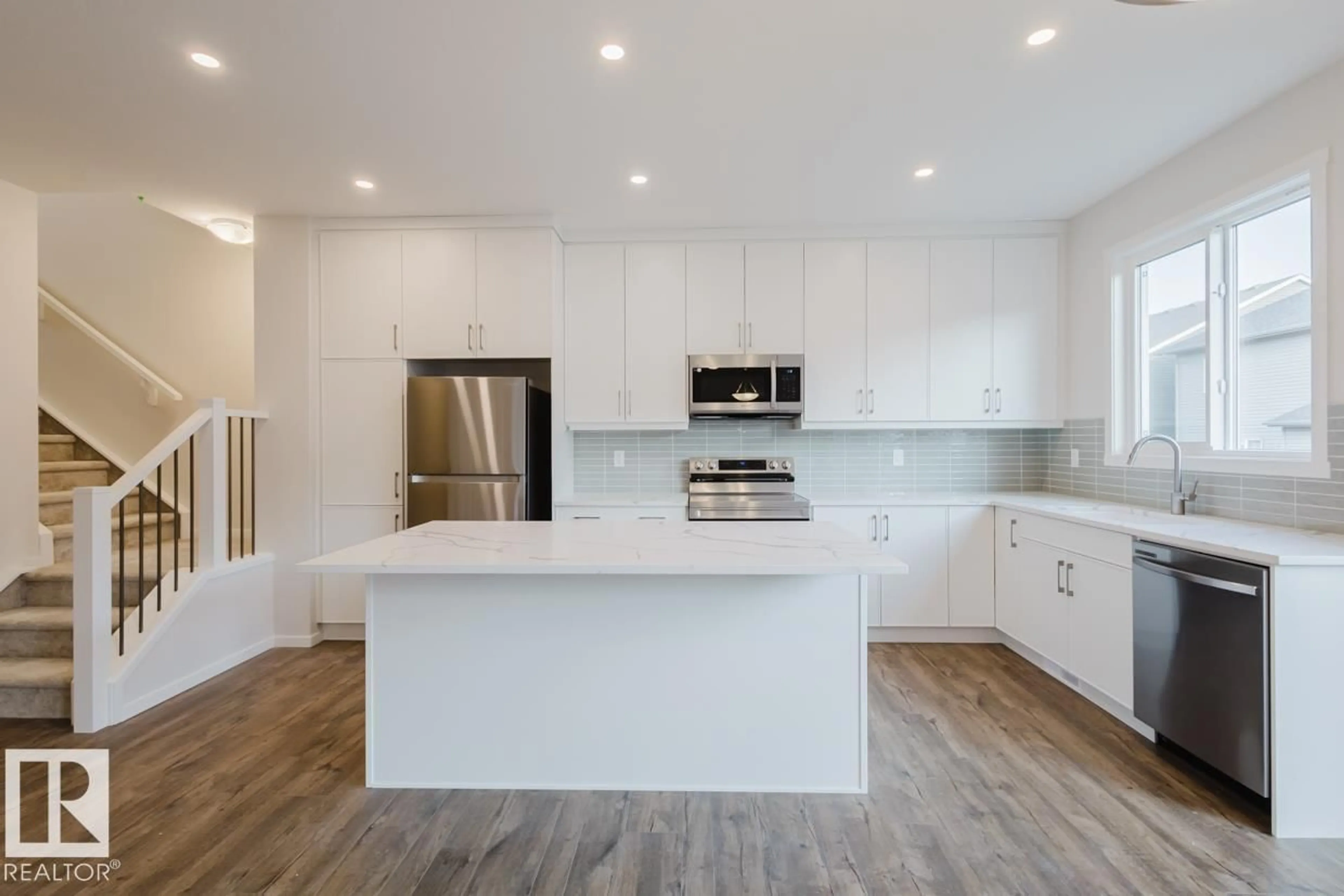 Open concept kitchen, unknown for NW - 20409 16A AV, Edmonton Alberta T6M2X6