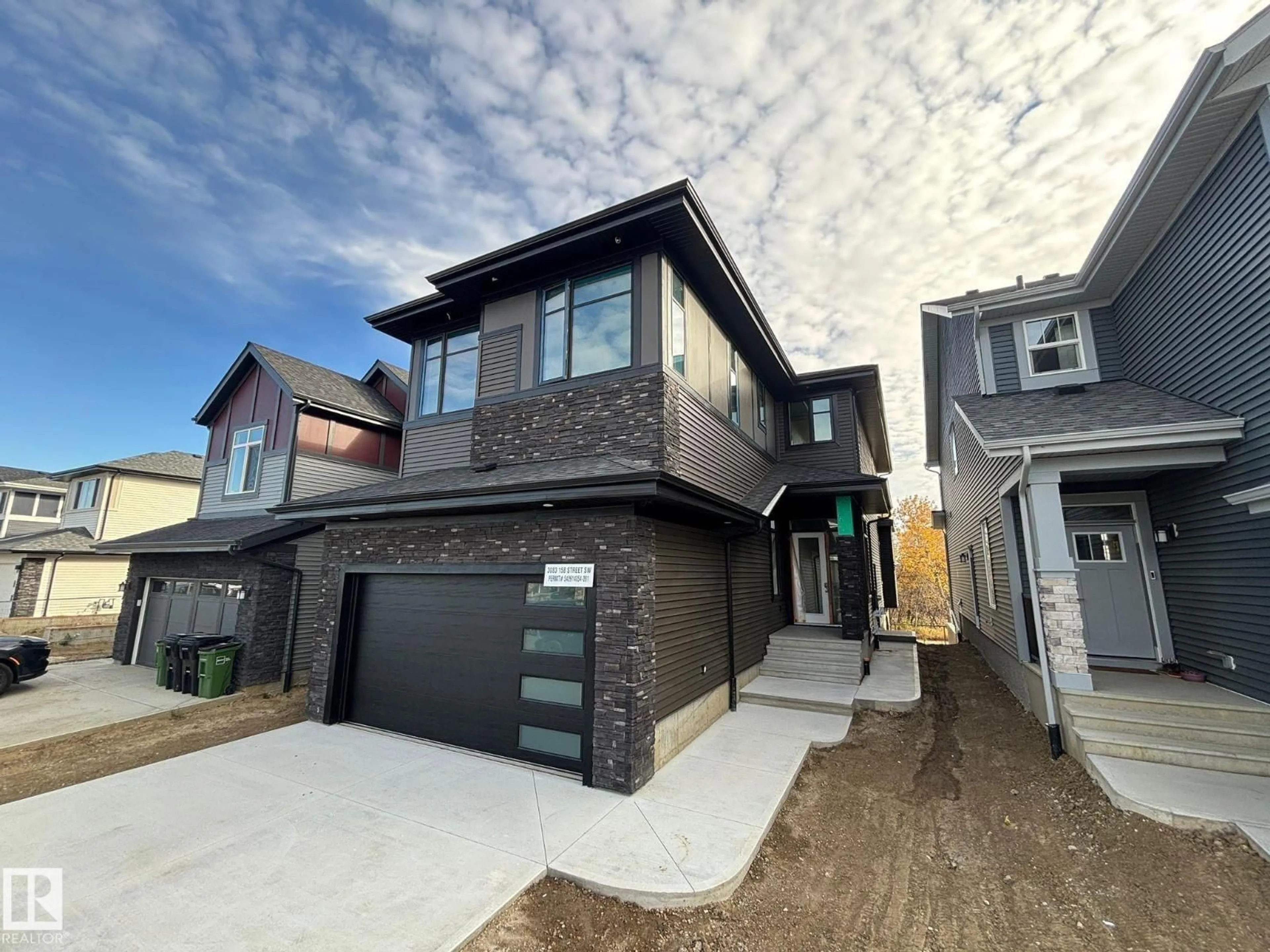 Home with brick exterior material, street for SW - 3083 158 ST, Edmonton Alberta T6W5H5