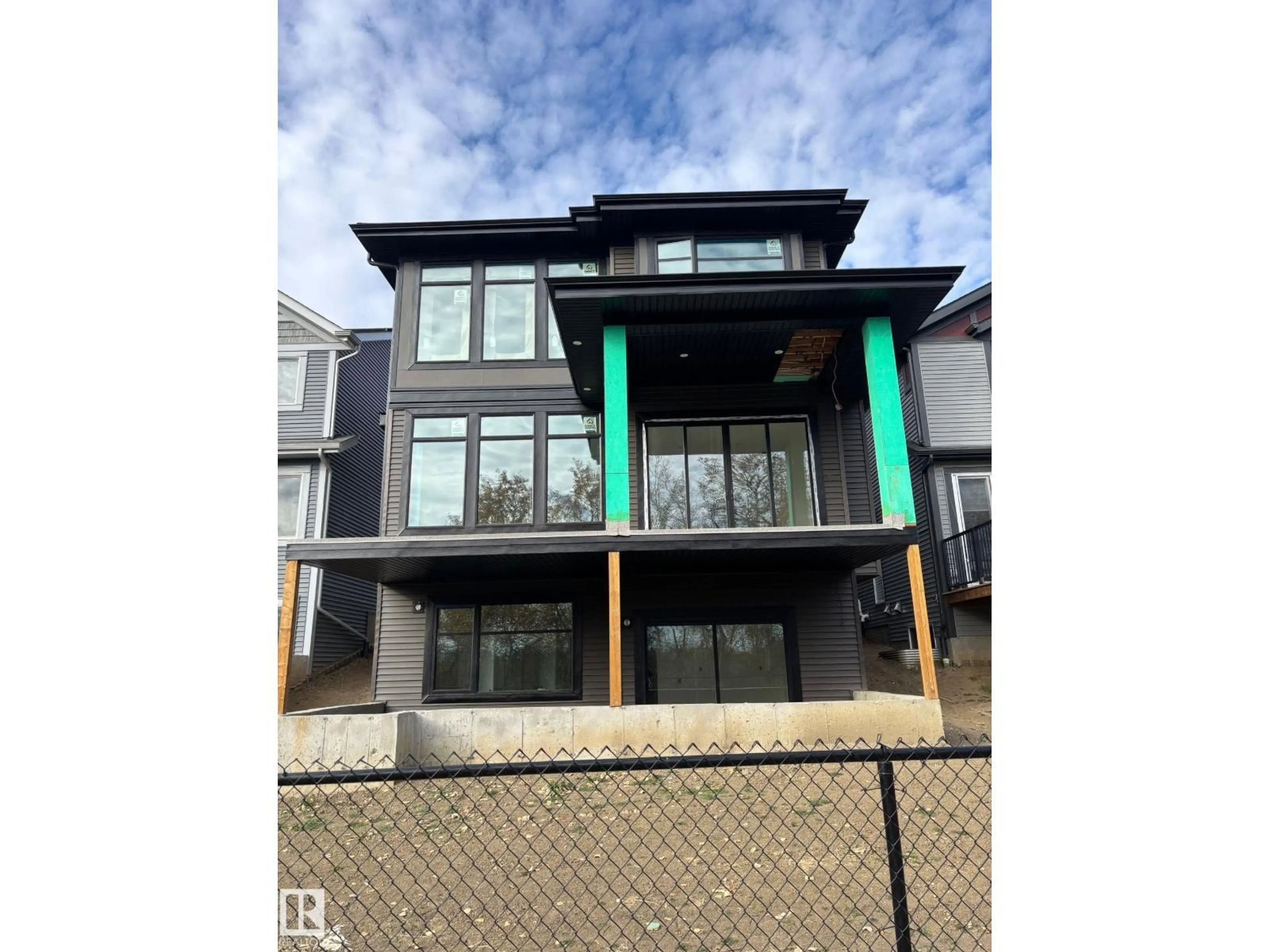 Home with vinyl exterior material, street for SW - 3083 158 ST, Edmonton Alberta T6W5H5