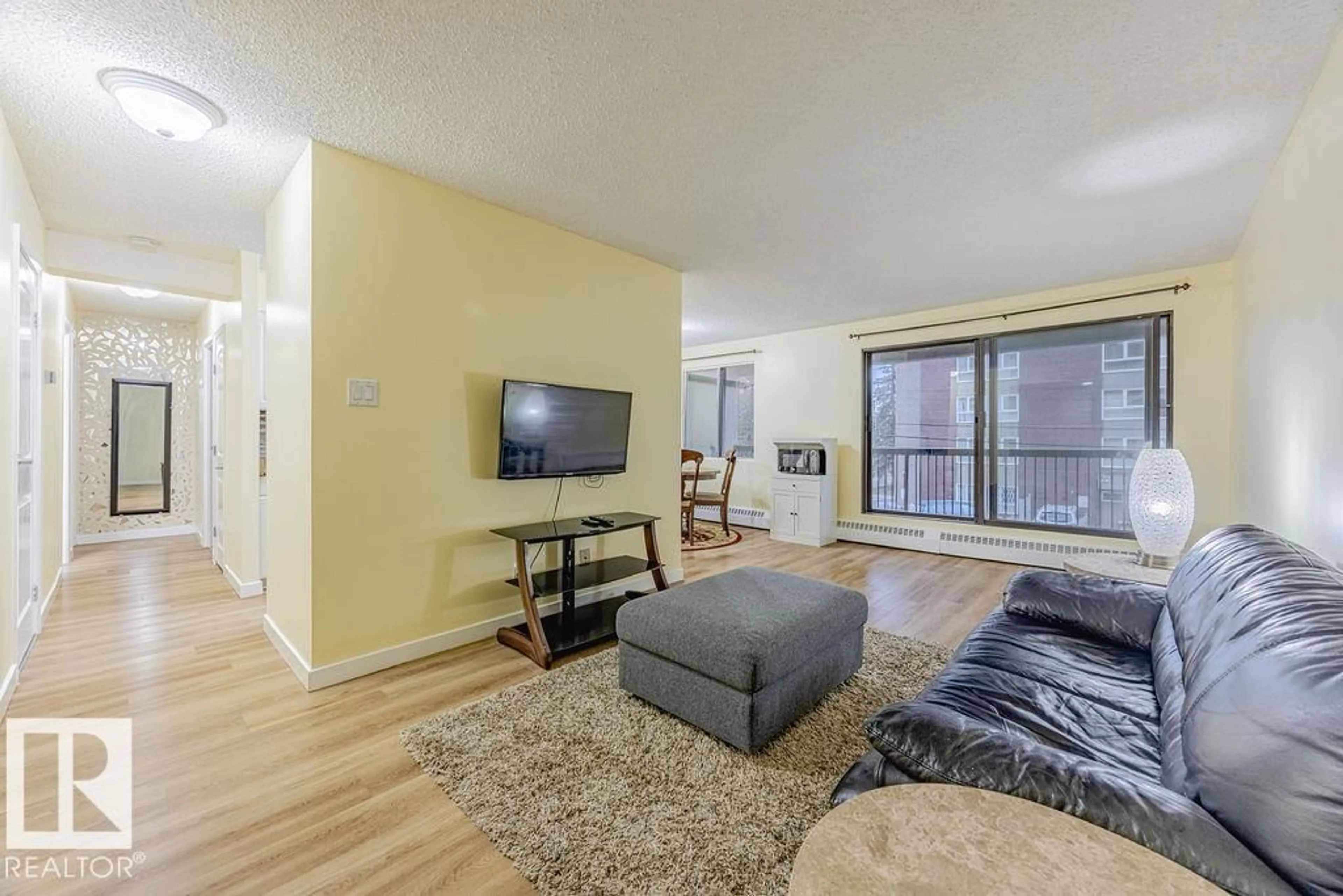 Living room with furniture, wood/laminate floor for #203 - 12841 65 ST, Edmonton Alberta T5N4N4