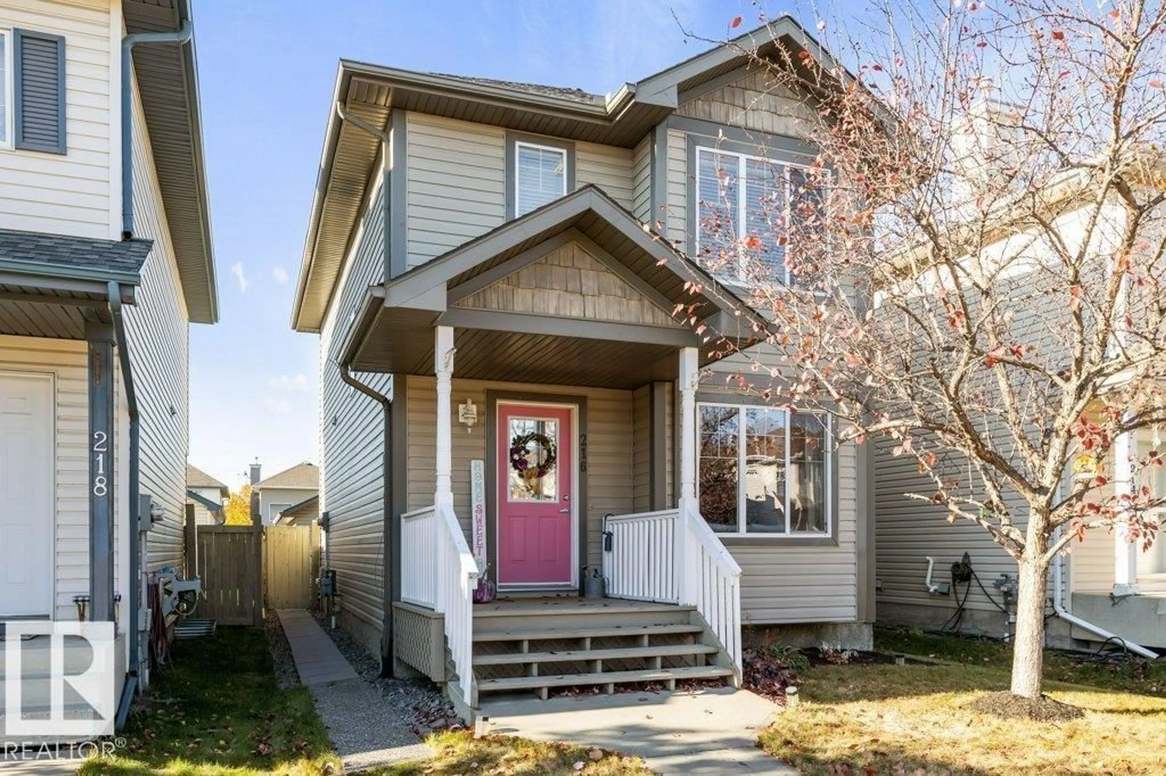 Home with vinyl exterior material, street for 216 84 ST, Edmonton Alberta T6X1H6