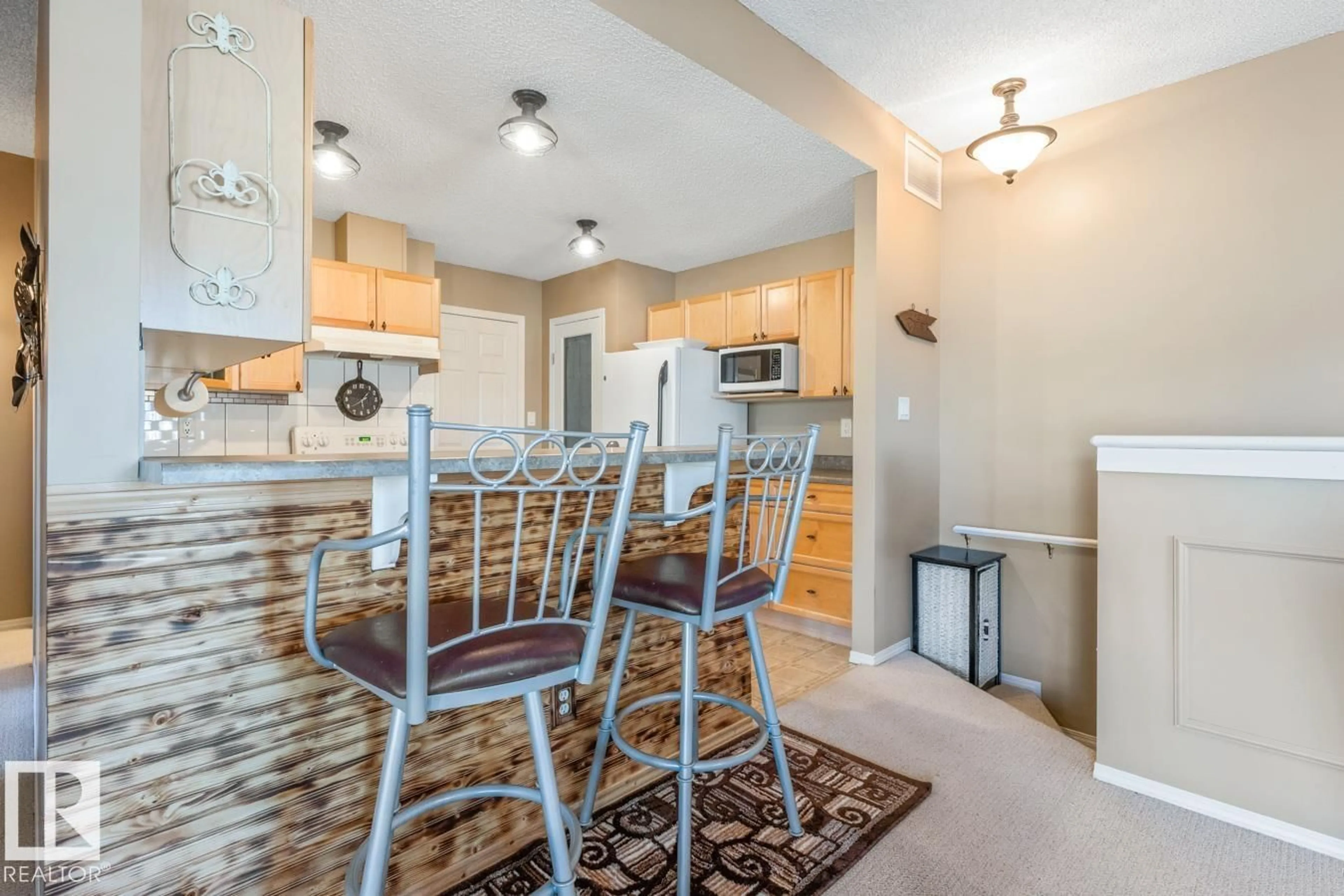Open concept kitchen, unknown for #10 - 2508 HANNA CR, Edmonton Alberta T6R3N7