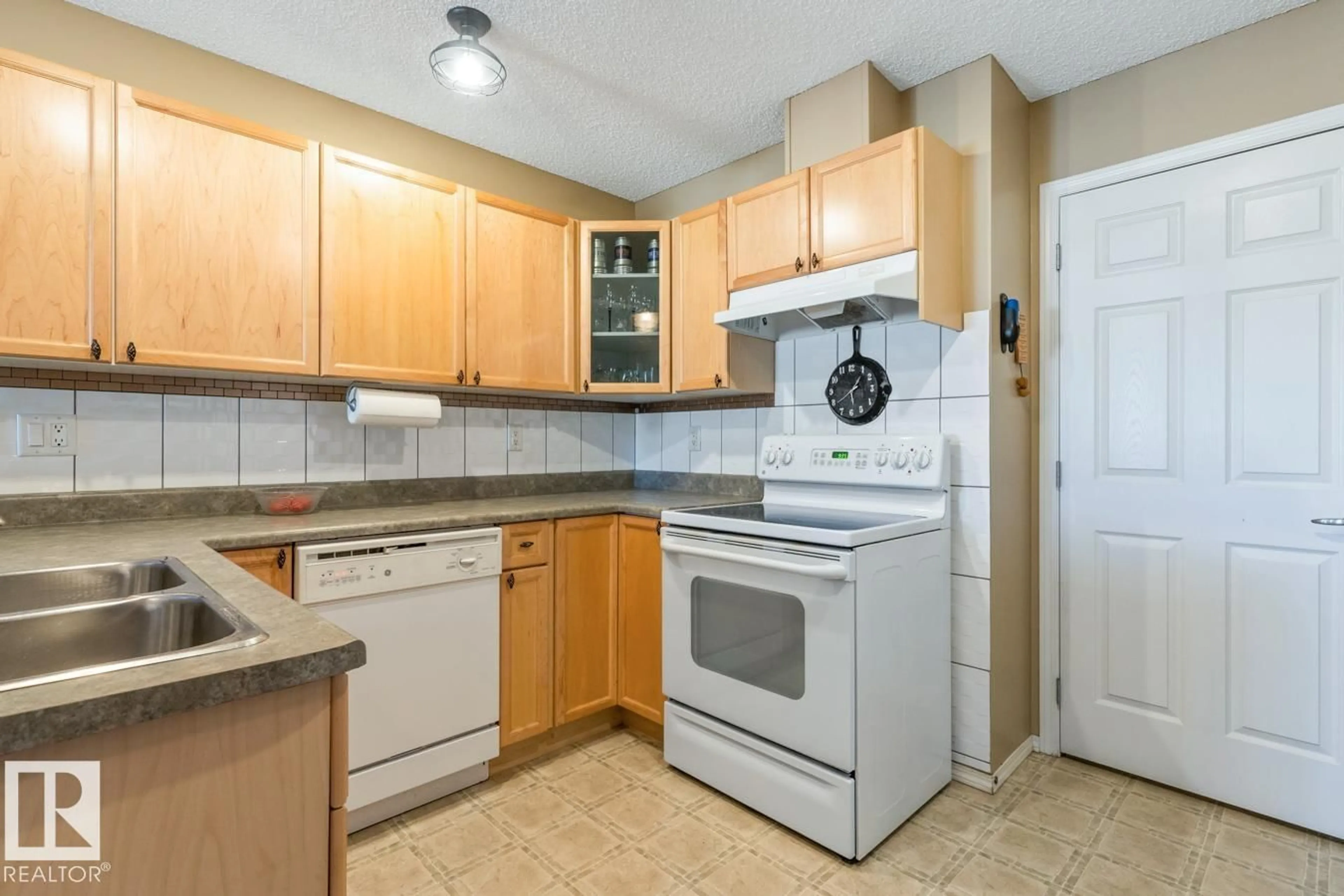 Standard kitchen, unknown for #10 - 2508 HANNA CR, Edmonton Alberta T6R3N7