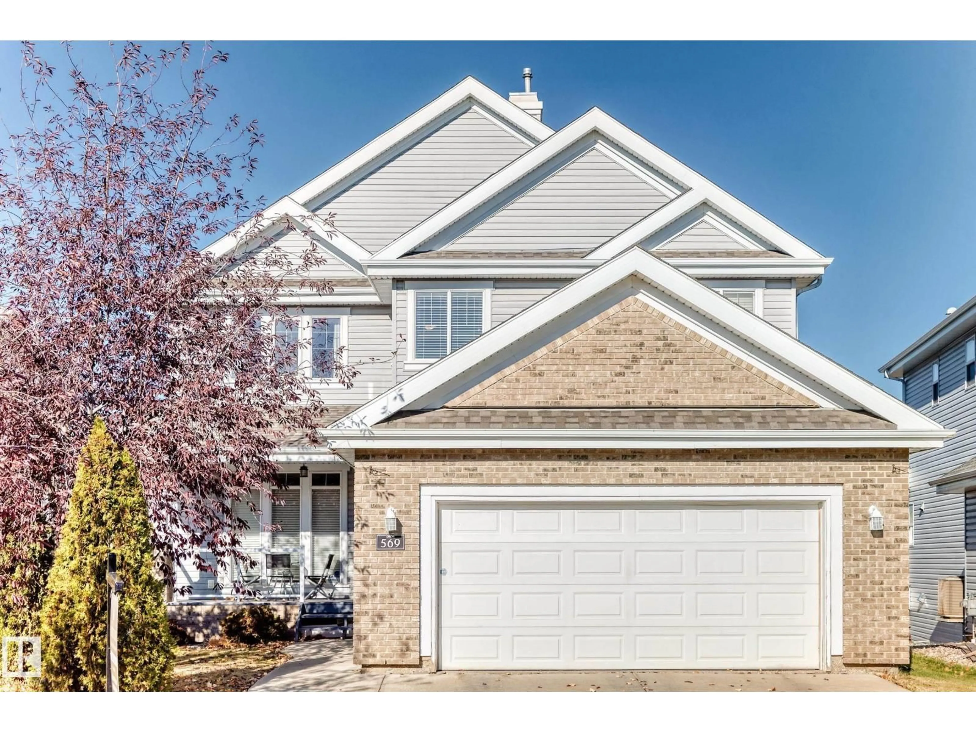 Home with vinyl exterior material, street for 569 STEWART CR, Edmonton Alberta T6X1B6