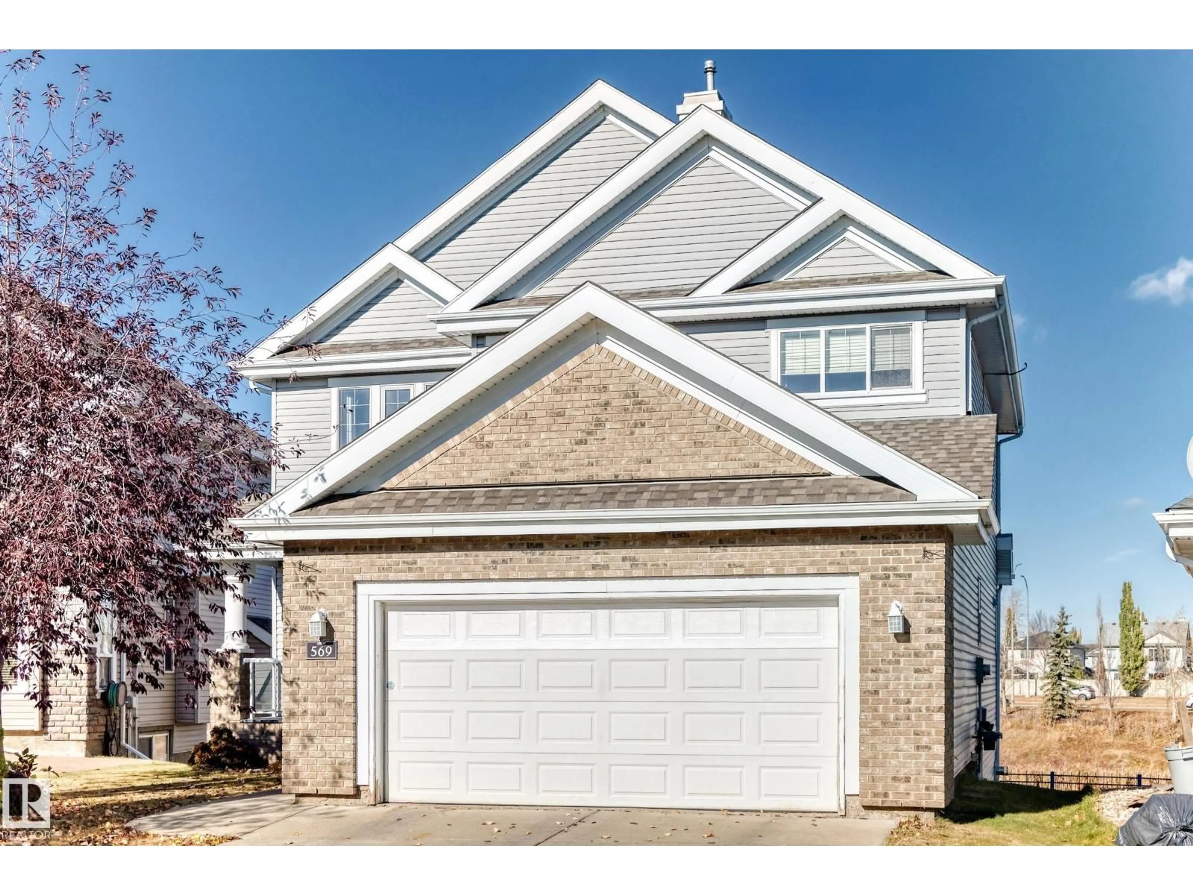 Home with vinyl exterior material, street for 569 STEWART CR, Edmonton Alberta T6X1B6