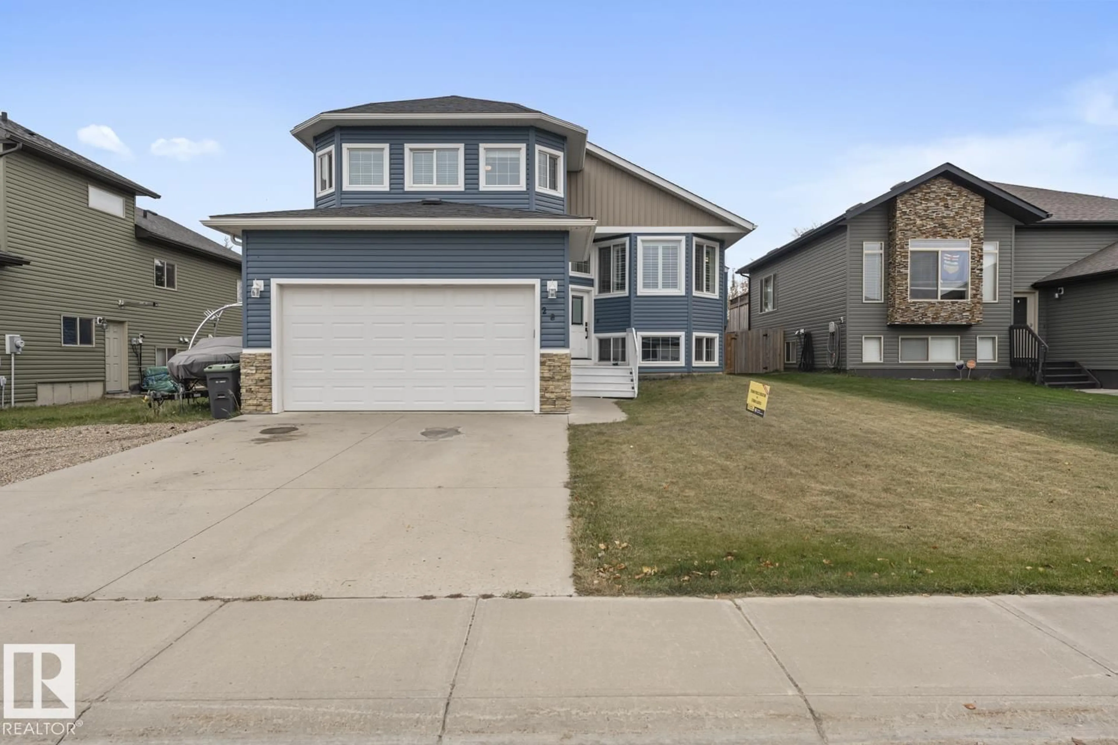 Home with vinyl exterior material, street for 28 FALCON RD, Cold Lake Alberta T9M0G4