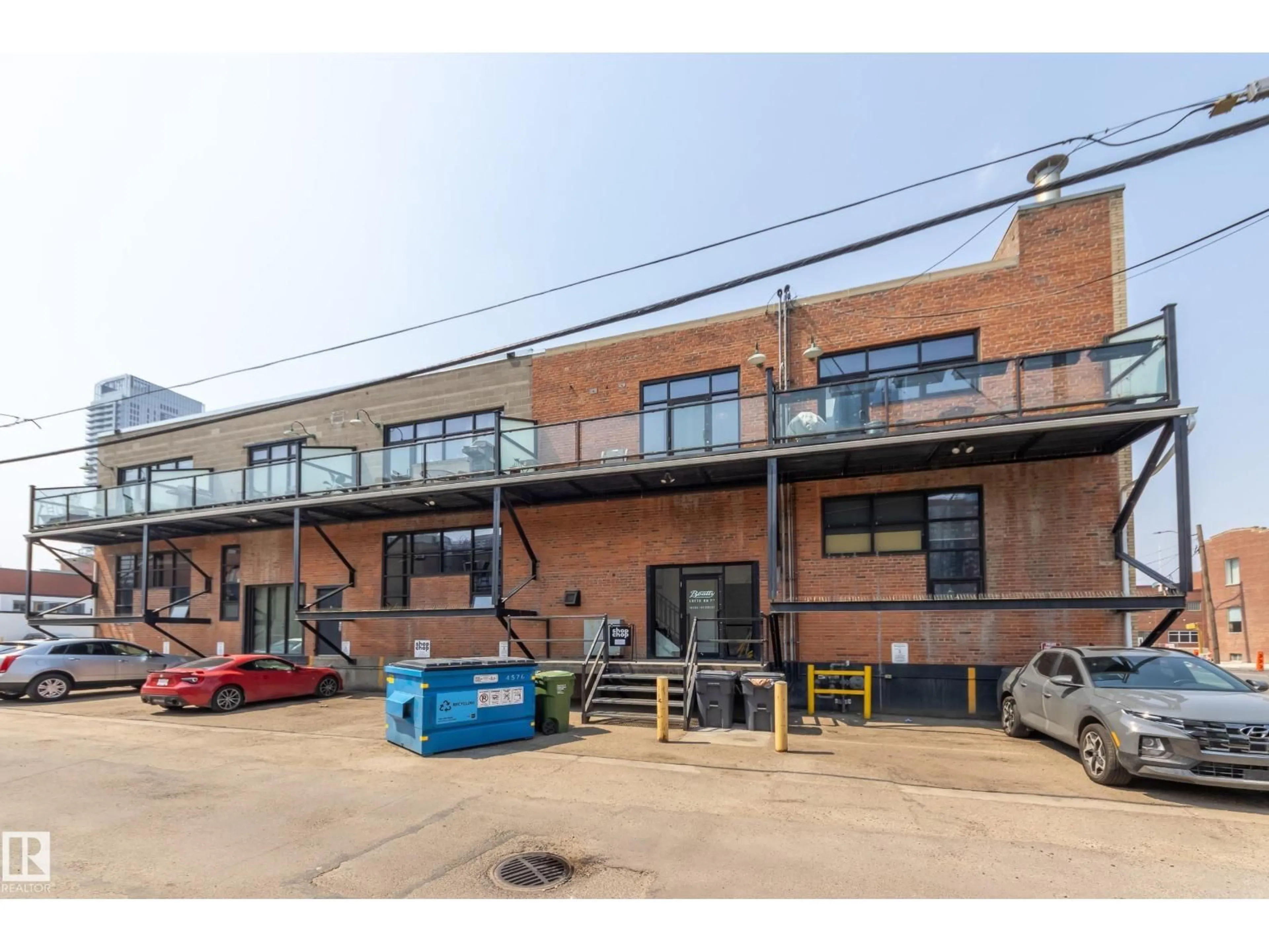 A pic from outside/outdoor area/front of a property/back of a property/a pic from drone, building for #104 - 10265 107 ST, Edmonton Alberta T5J5G2