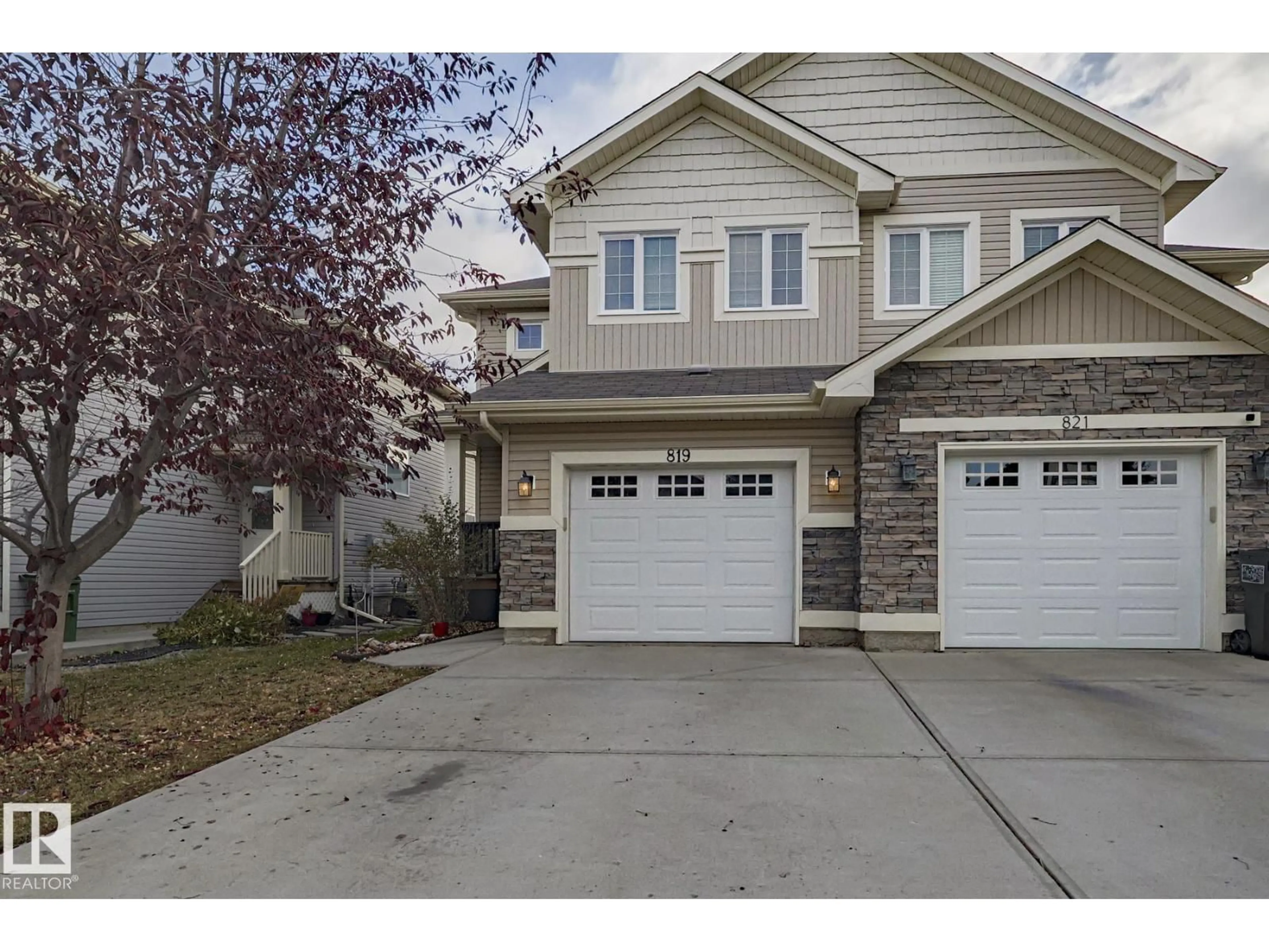 Home with vinyl exterior material, street for 819 172 ST, Edmonton Alberta T6W0M6