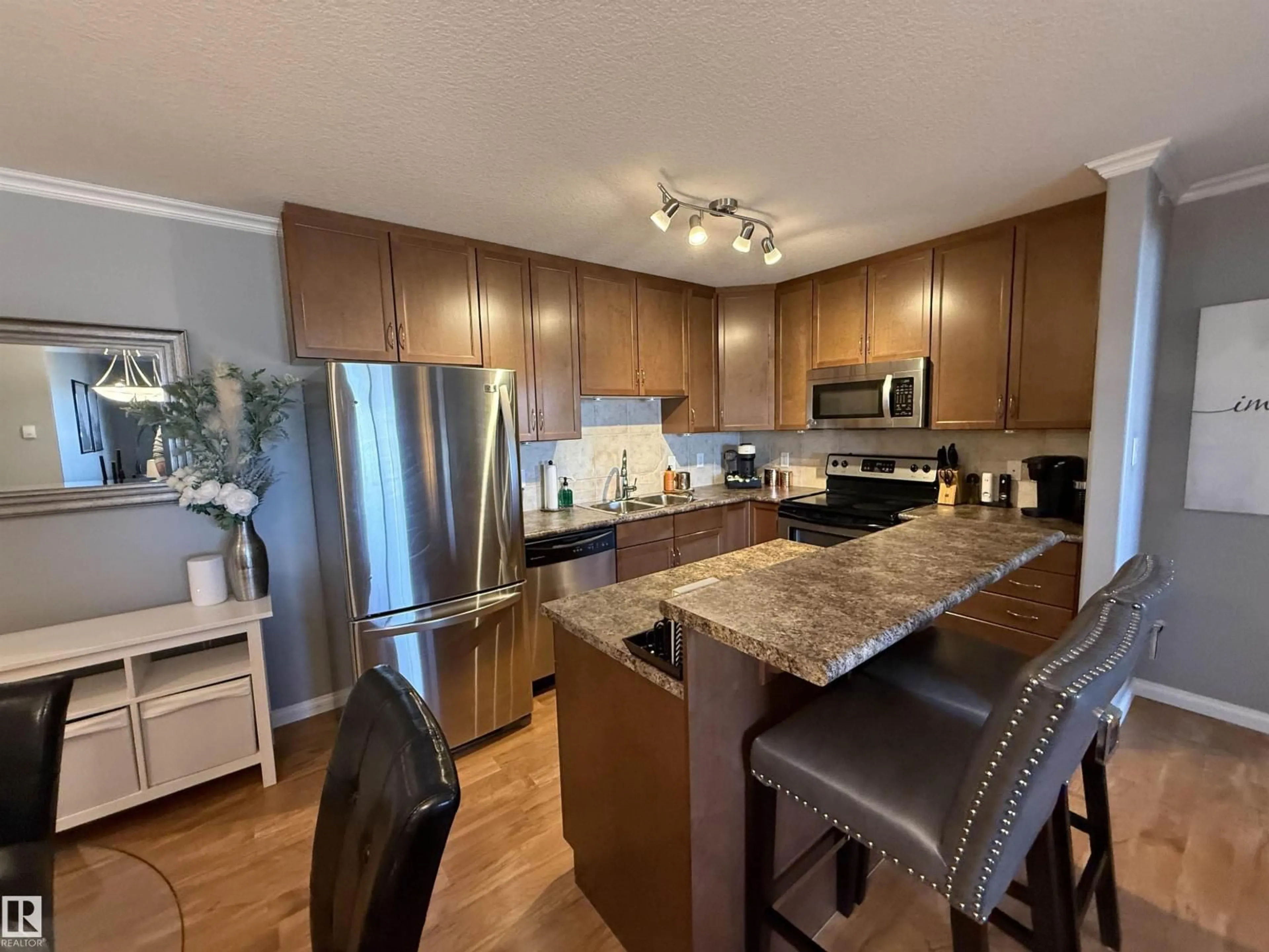Open concept kitchen, wood/laminate floor for 415 - 1204 156 ST, Edmonton Alberta T6R0R6