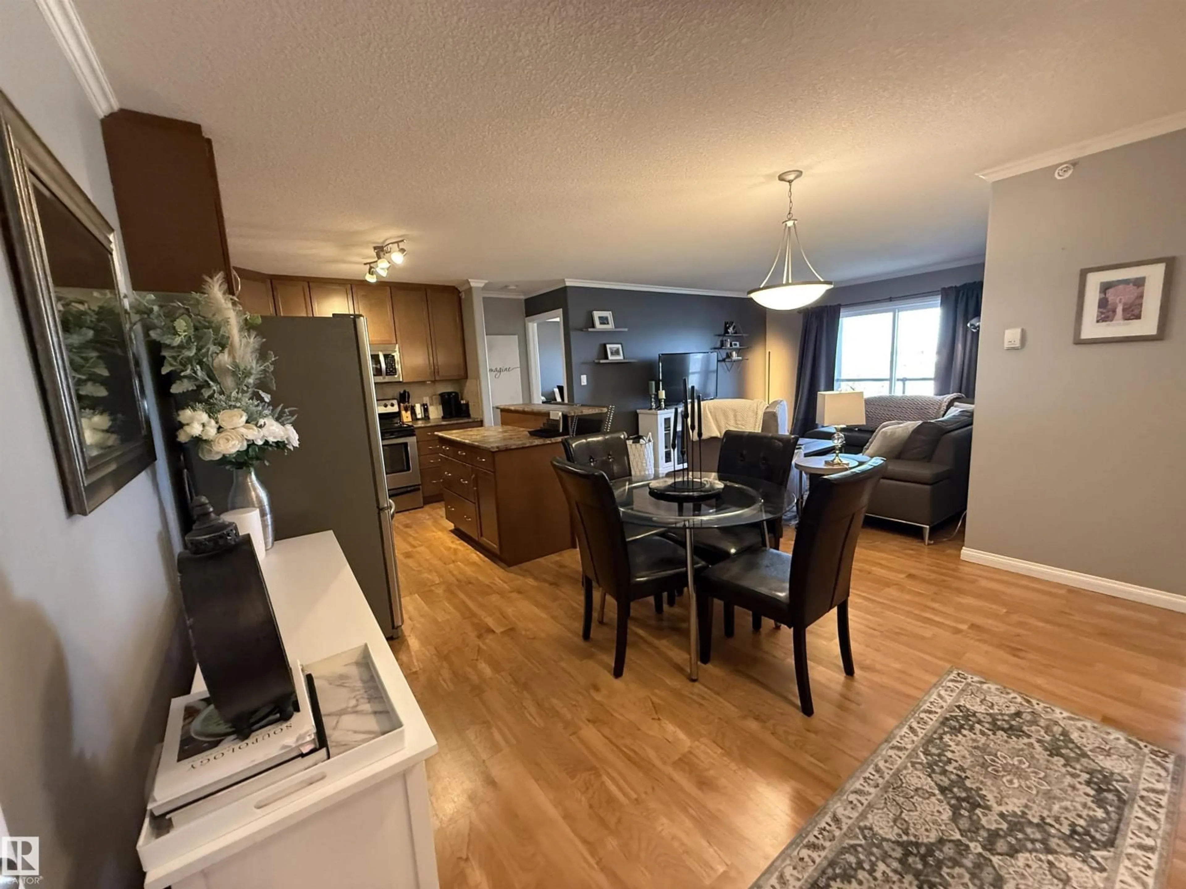 Open concept kitchen, wood/laminate floor for 415 - 1204 156 ST, Edmonton Alberta T6R0R6