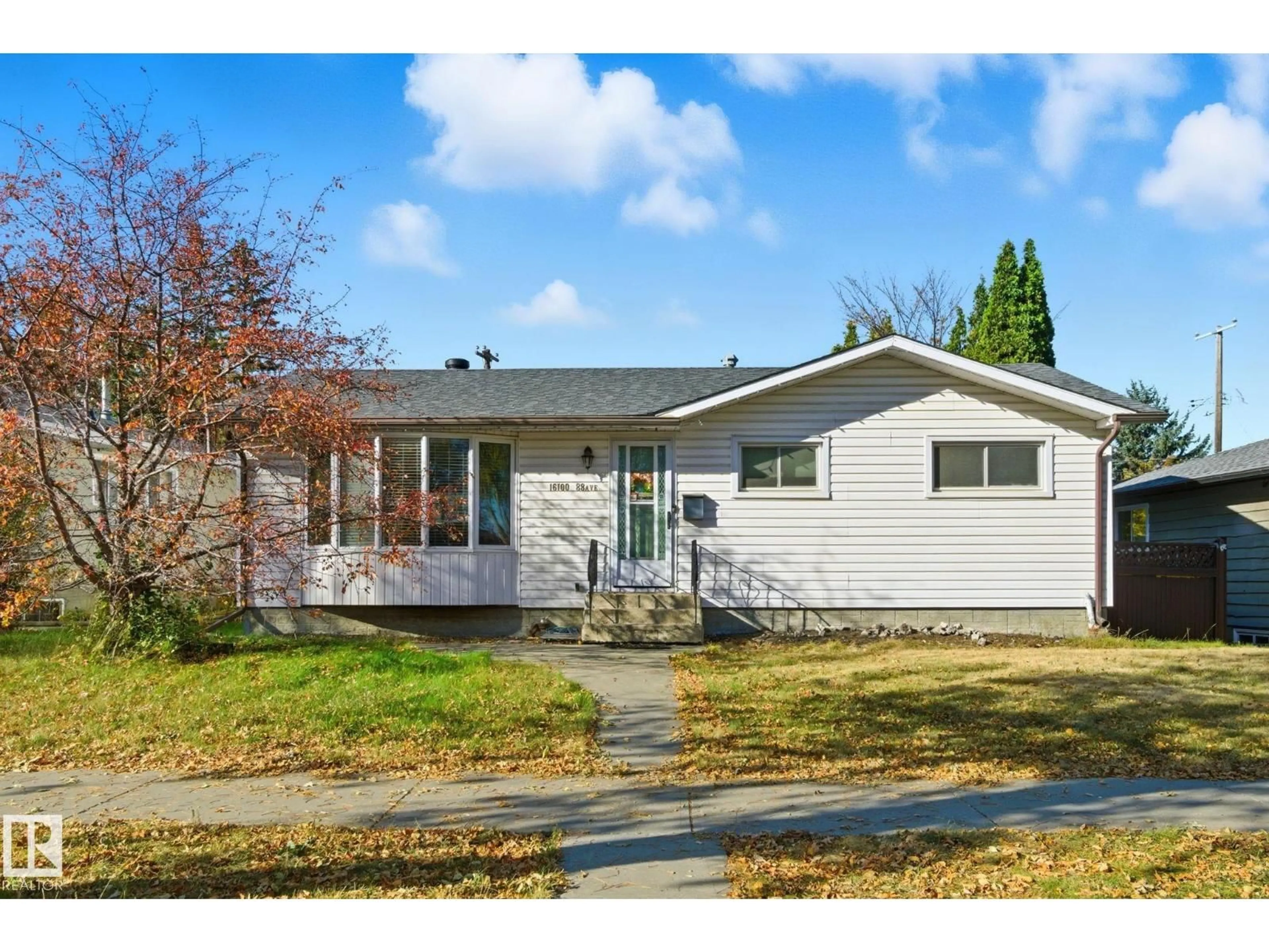 Home with vinyl exterior material, street for NW - 16100 88 AV, Edmonton Alberta T5R4M4