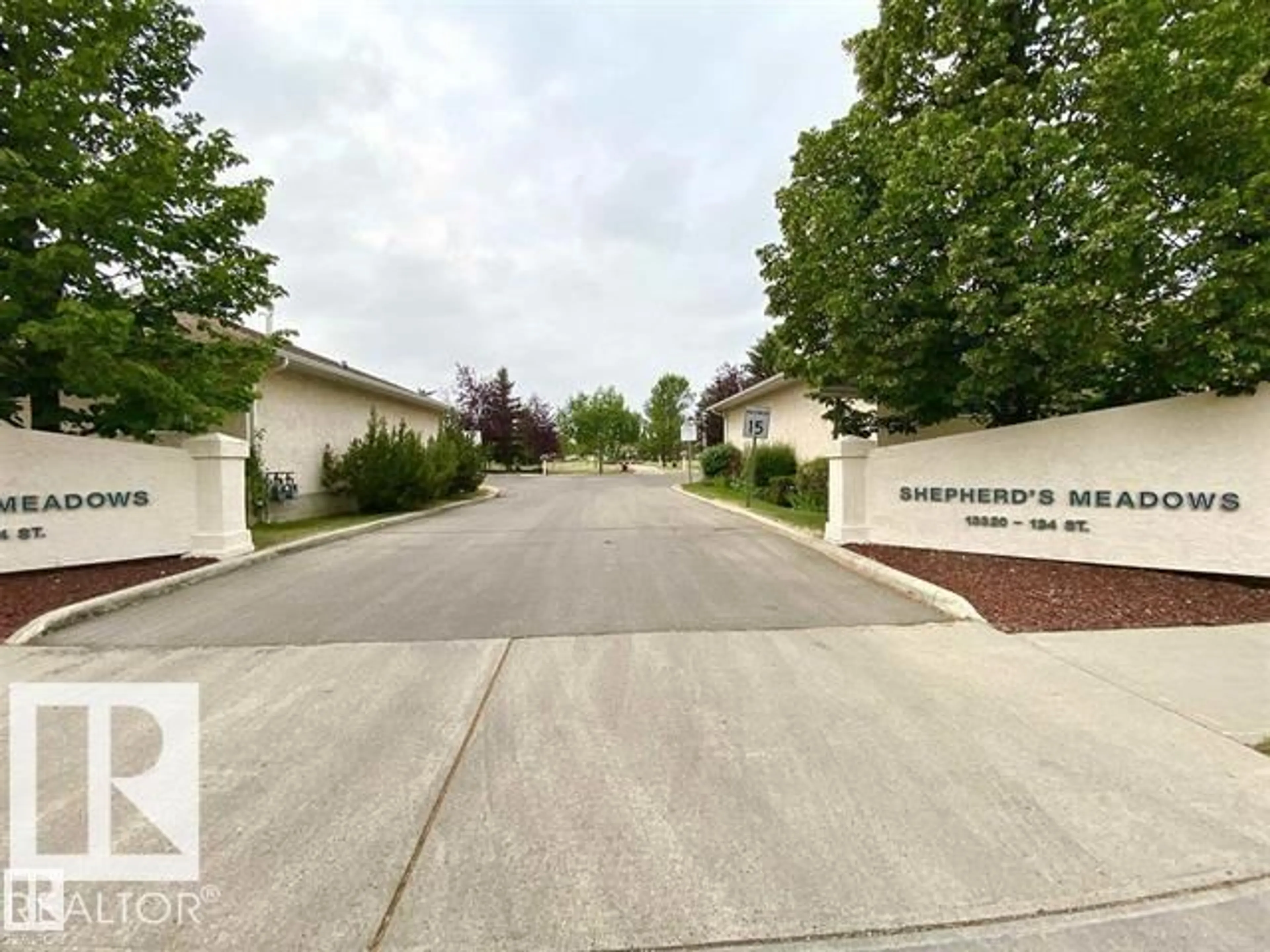 A pic from outside/outdoor area/front of a property/back of a property/a pic from drone, street for 13320 - 22 124 ST NW, Edmonton Alberta T5L5B2