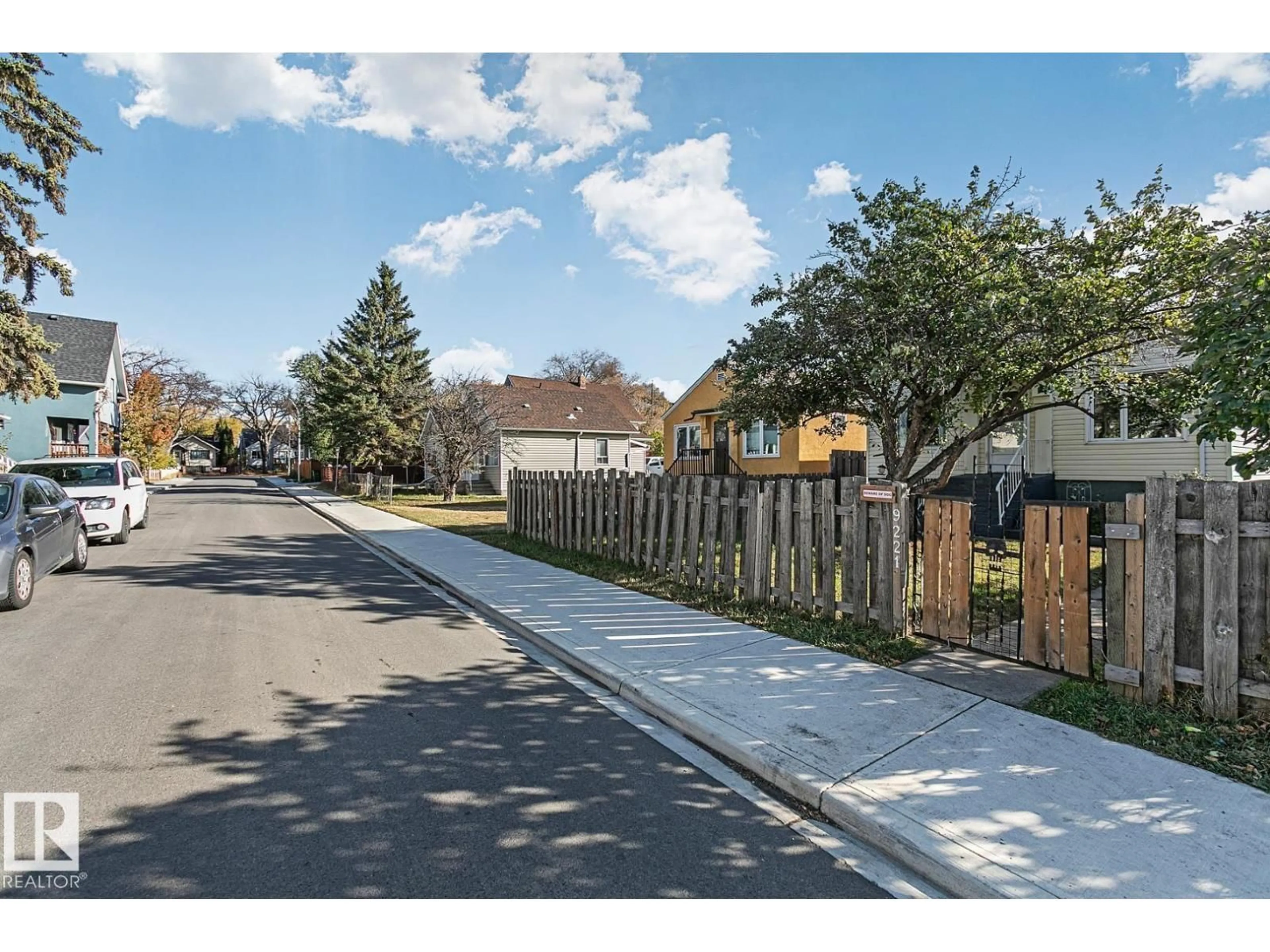 A pic from outside/outdoor area/front of a property/back of a property/a pic from drone, street for 9221 110 AV, Edmonton Alberta T5H1H2