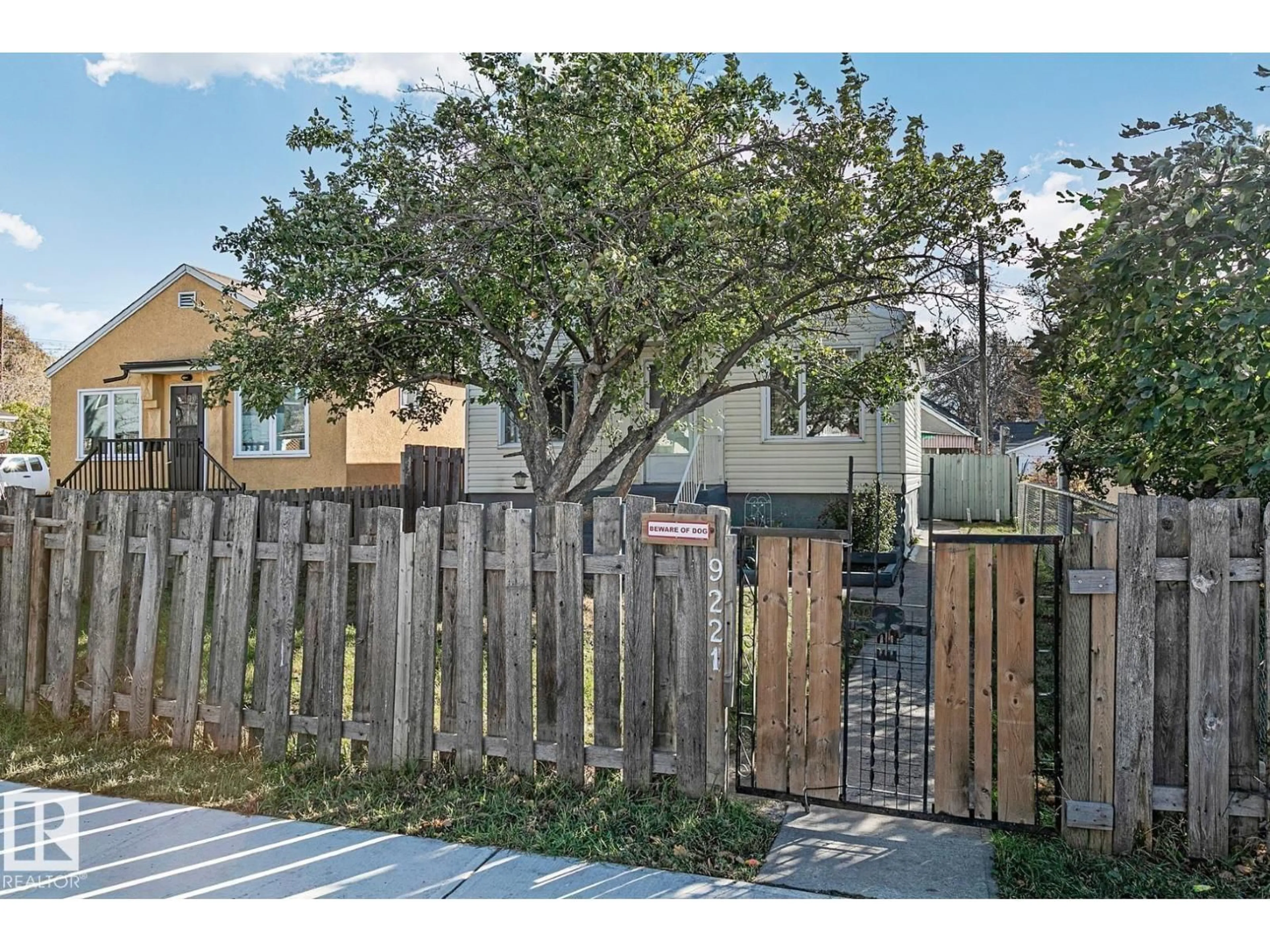A pic from outside/outdoor area/front of a property/back of a property/a pic from drone, street for 9221 110 AV, Edmonton Alberta T5H1H2