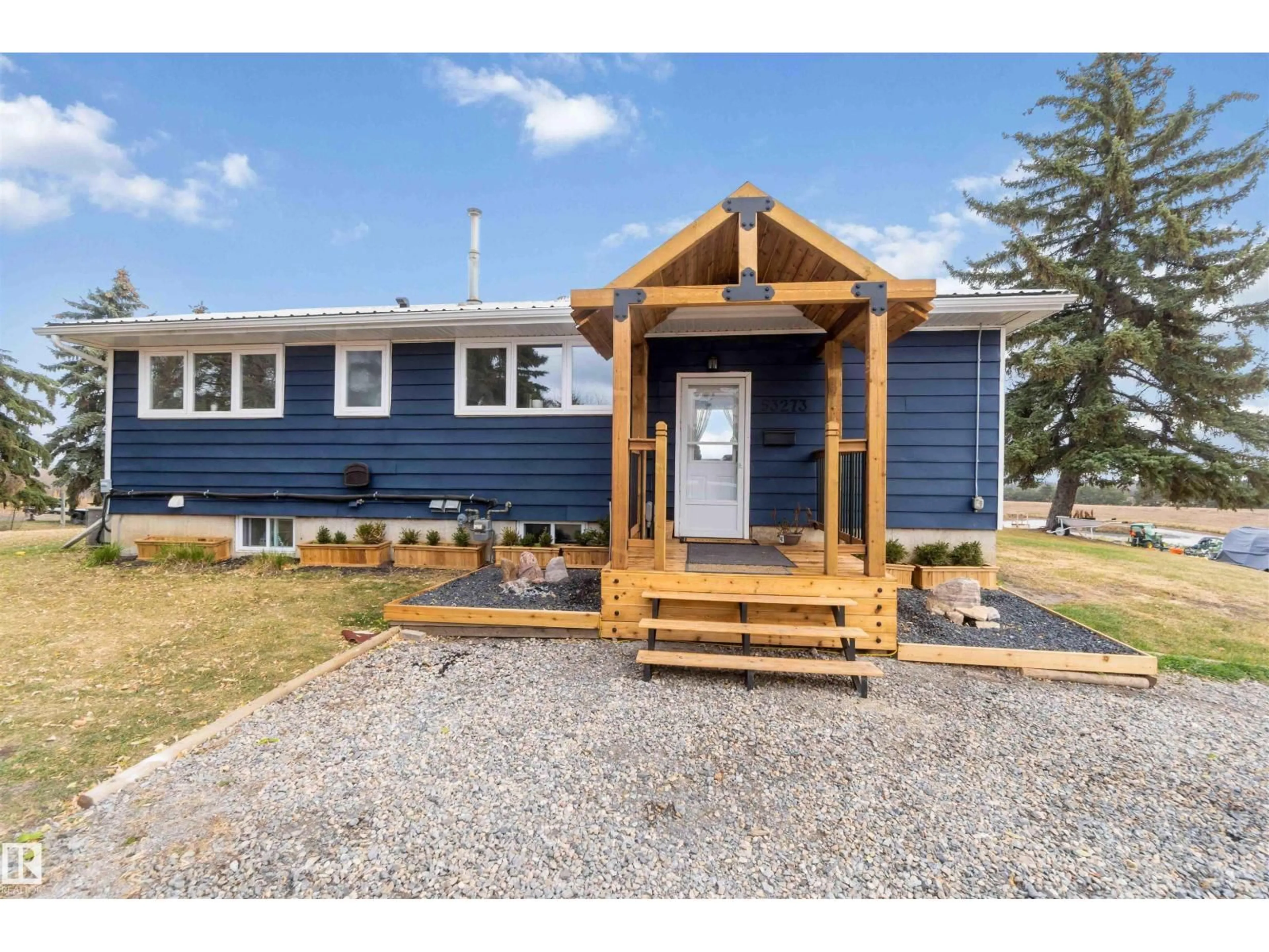 Home with vinyl exterior material, street for 53273 RGE ROAD 215, Rural Strathcona County Alberta T8E2B4