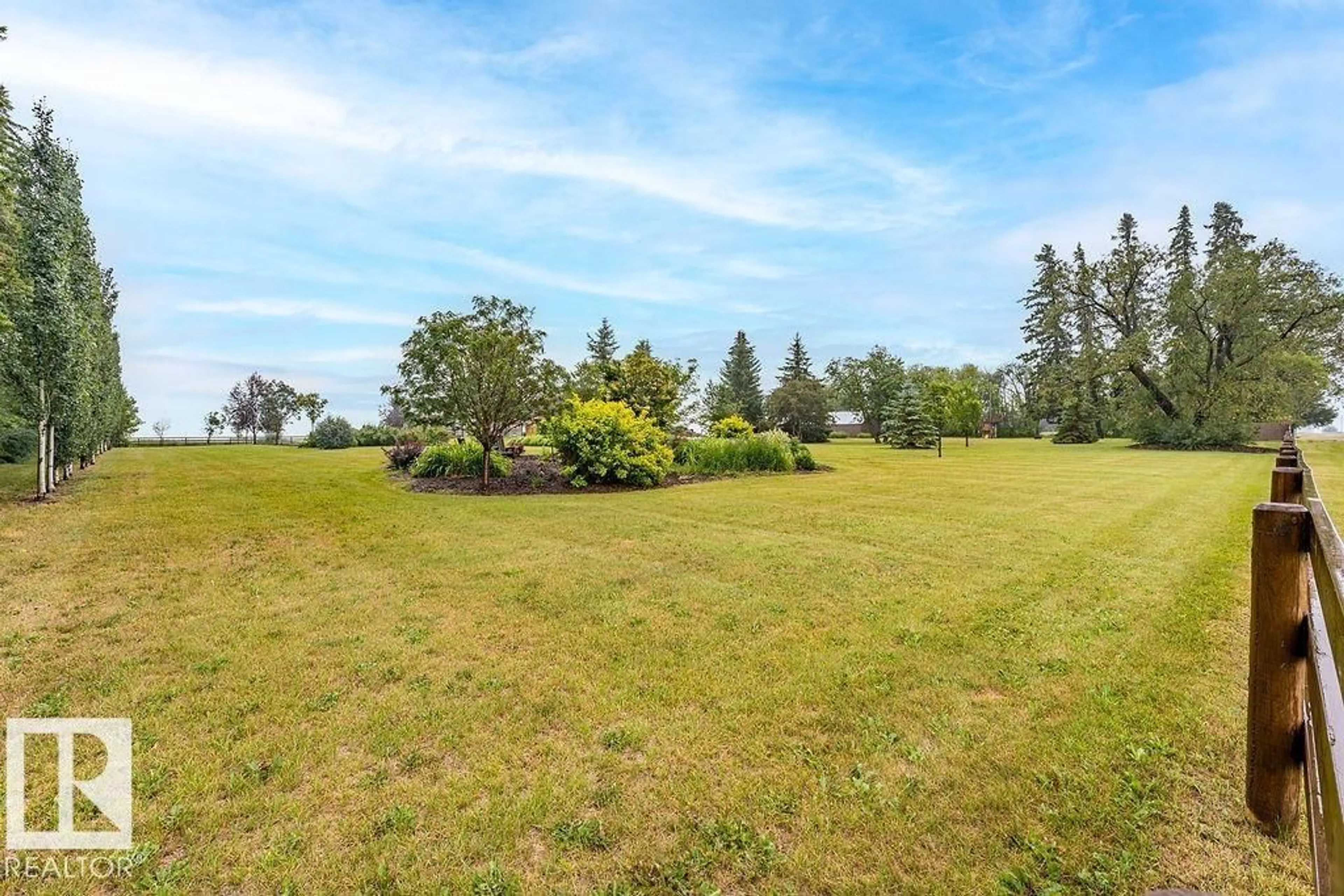A pic from outside/outdoor area/front of a property/back of a property/a pic from drone, water/lake/river/ocean view for 463051 RGE ROAD 235, Rural Wetaskiwin County Alberta T9A1W9