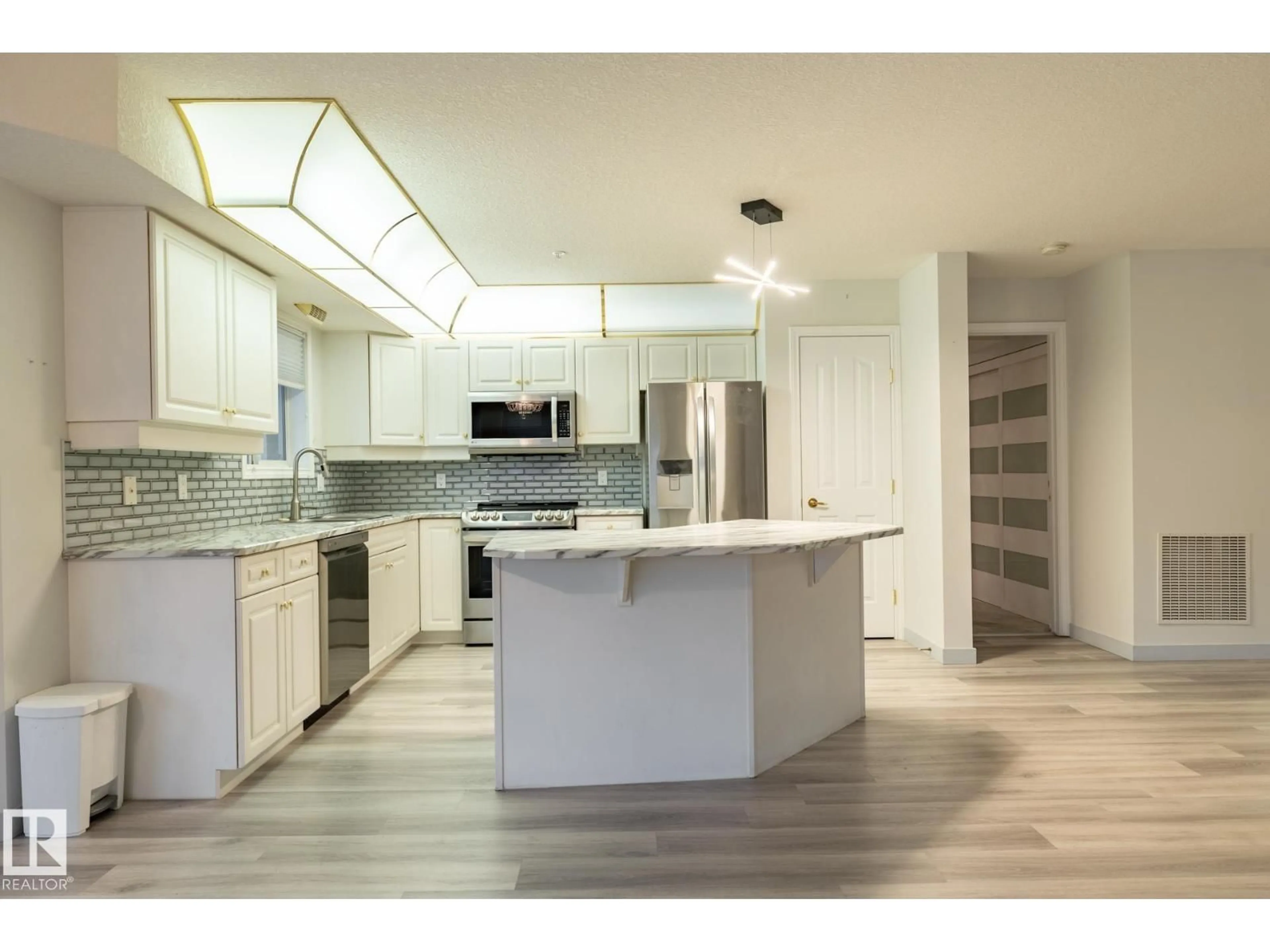 Open concept kitchen, ceramic/tile floor for #106 - 6703 172 ST, Edmonton Alberta T5T6H9