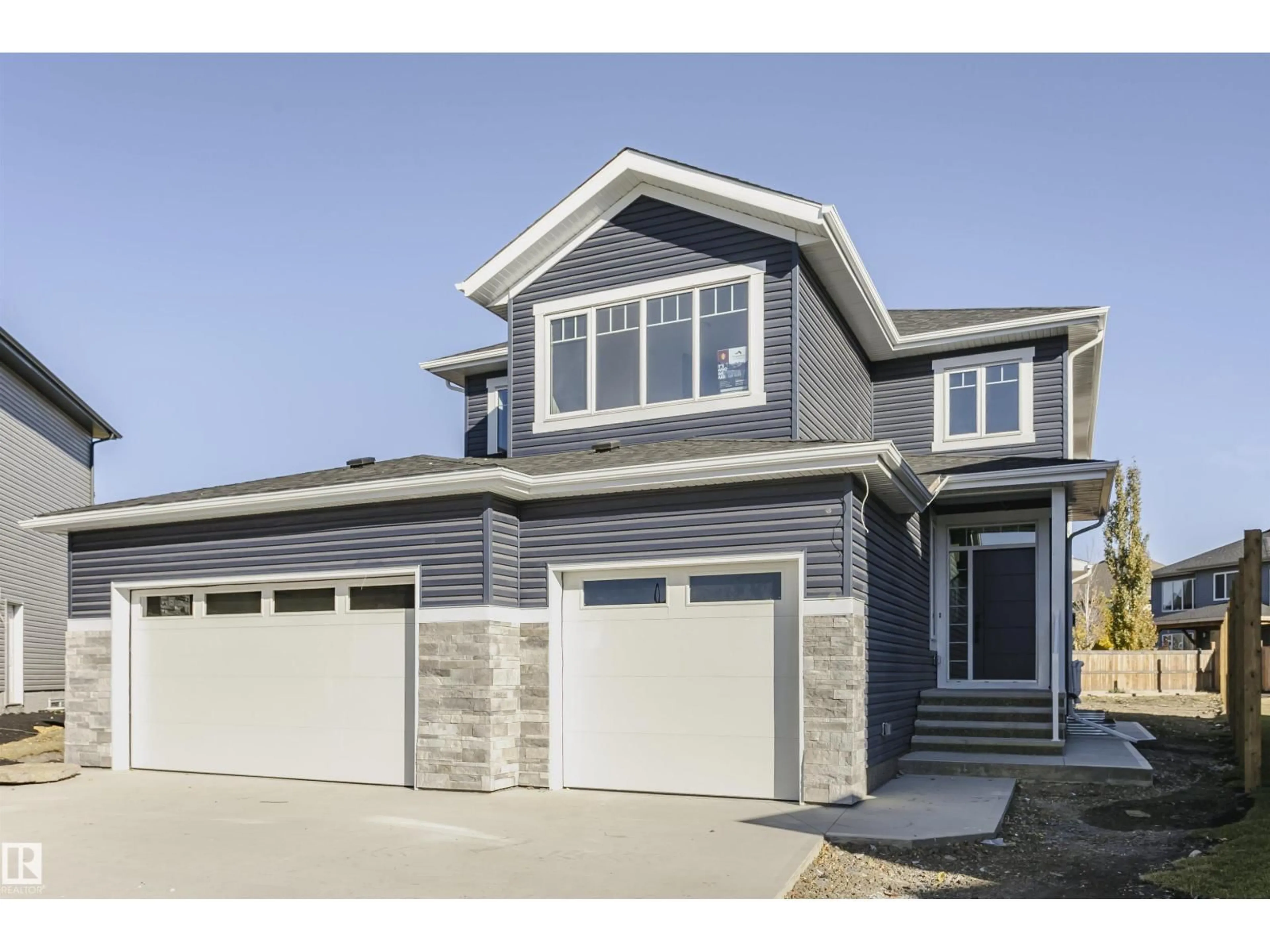 Home with vinyl exterior material, street for 3221 PELERIN CR, Beaumont Alberta T4X2Z1