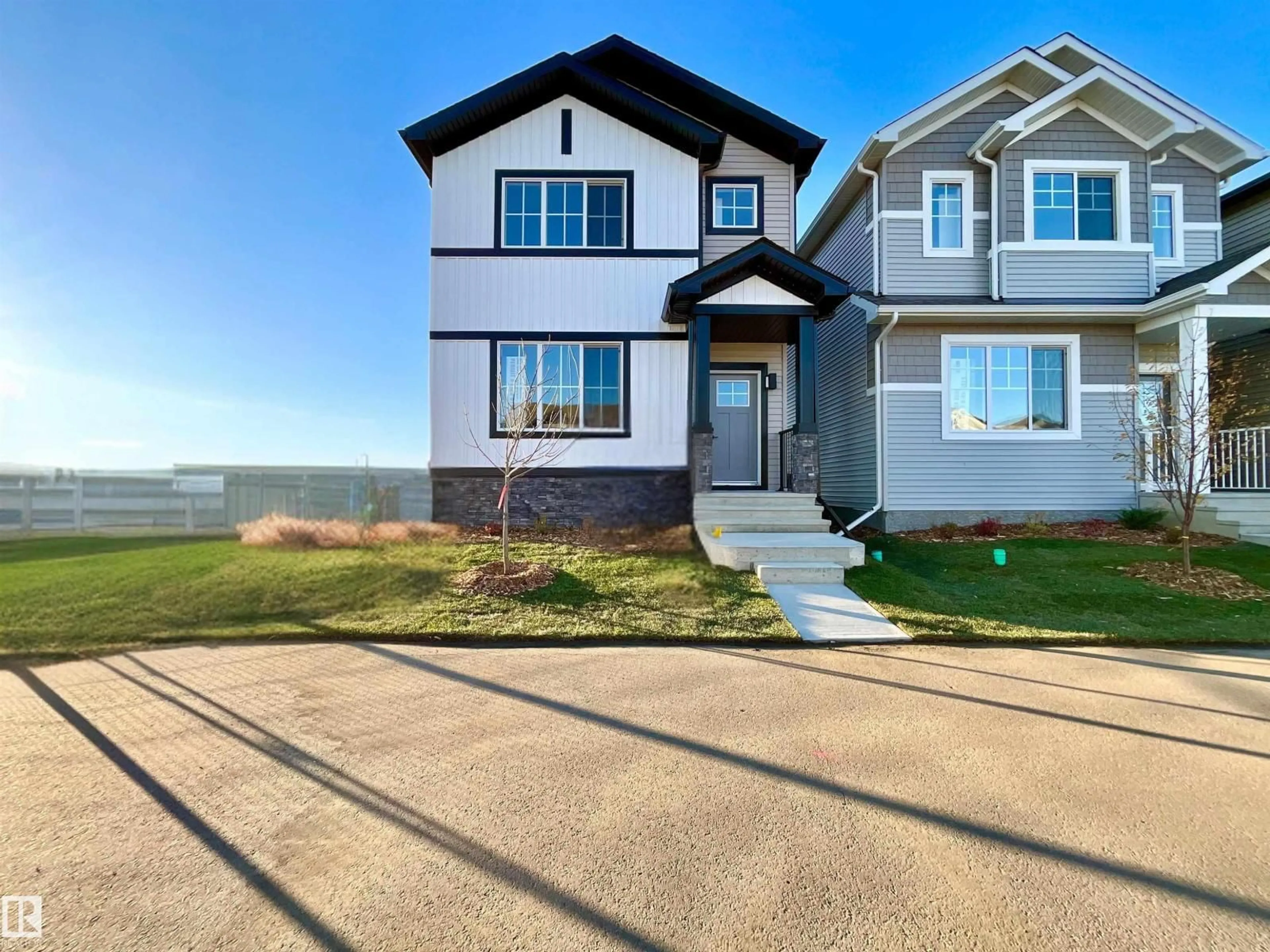 Home with vinyl exterior material, street for 63 SIENNA BV, Fort Saskatchewan Alberta T8L0W3