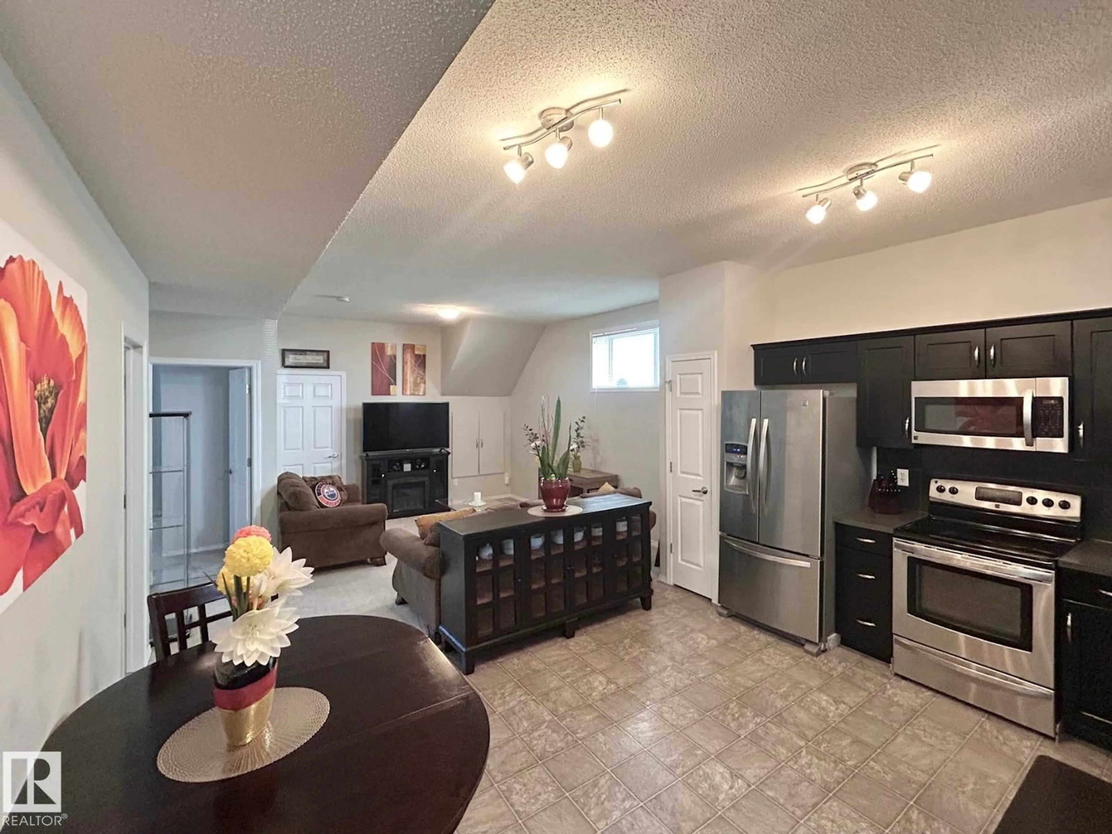Open concept kitchen, ceramic/tile floor for 142 - 206 SELKIRK PL, Leduc Alberta T9E0M9