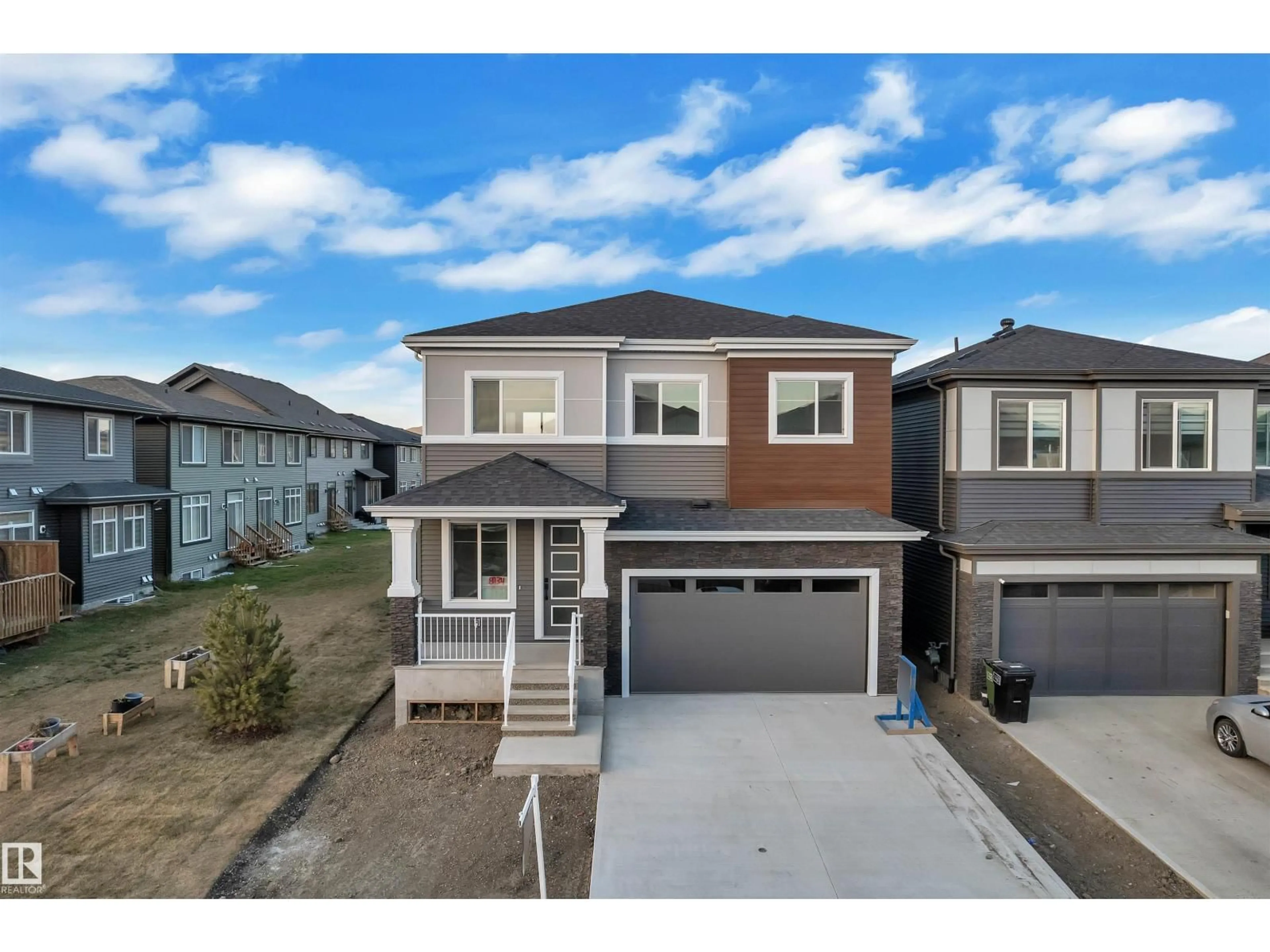 Home with vinyl exterior material, street for 8734 MAYDAY LN, Edmonton Alberta T6X2L3