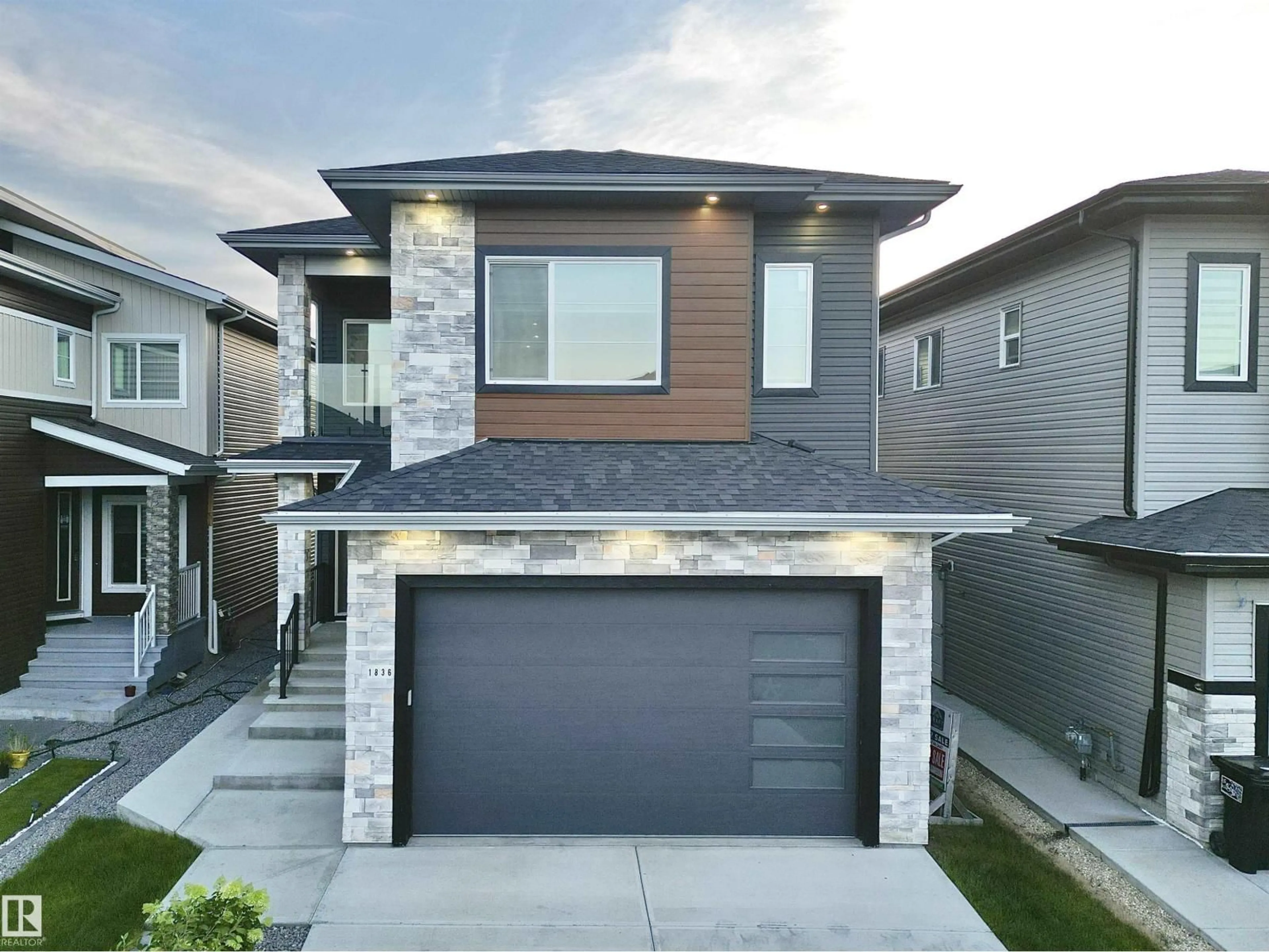 Home with brick exterior material, street for NW - 1836 22 ST, Edmonton Alberta T6T2M5