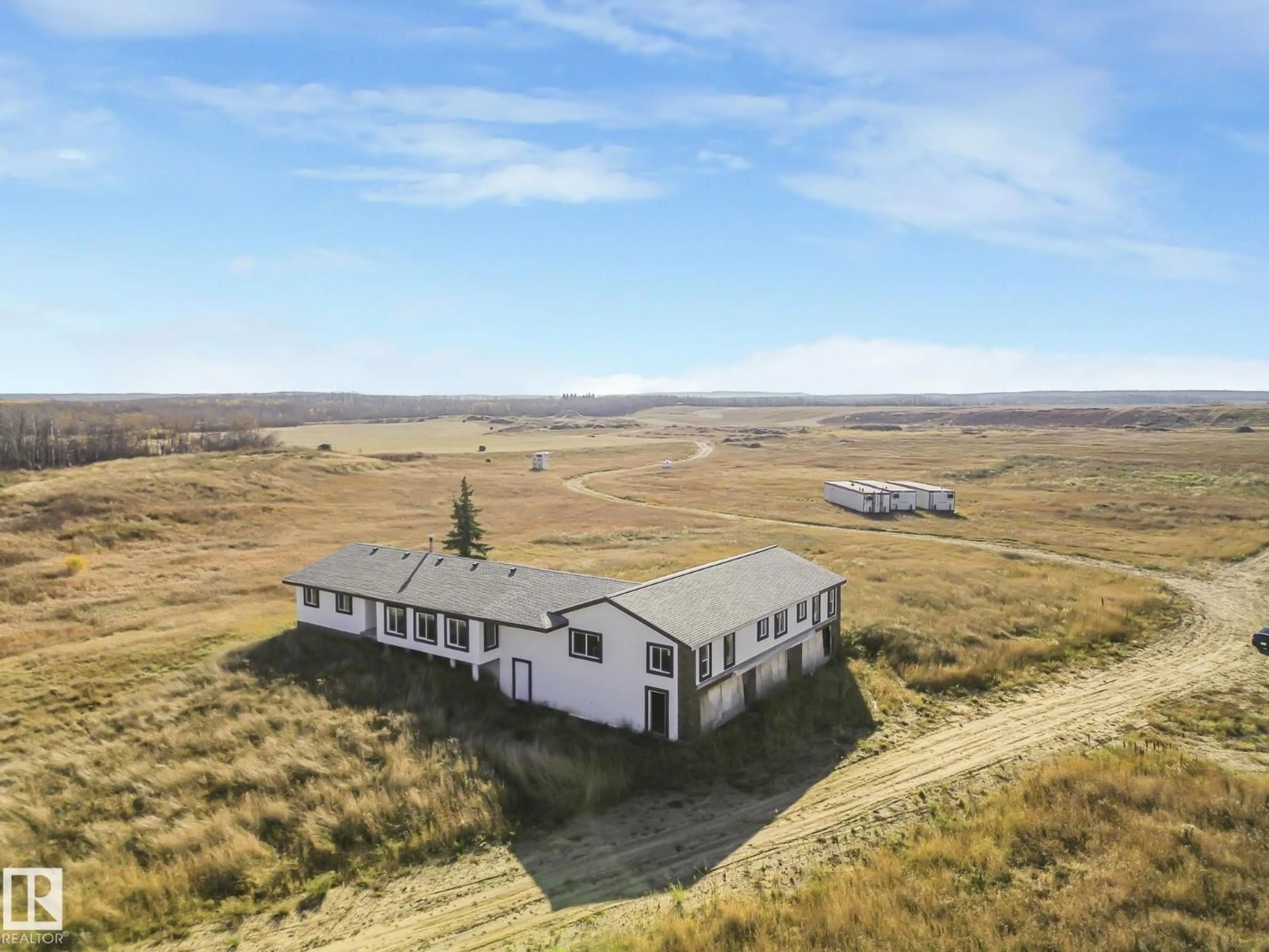 A pic from outside/outdoor area/front of a property/back of a property/a pic from drone, building for 45011 TWP RD 610, Rural Bonnyville M.D. Alberta T9N2H6