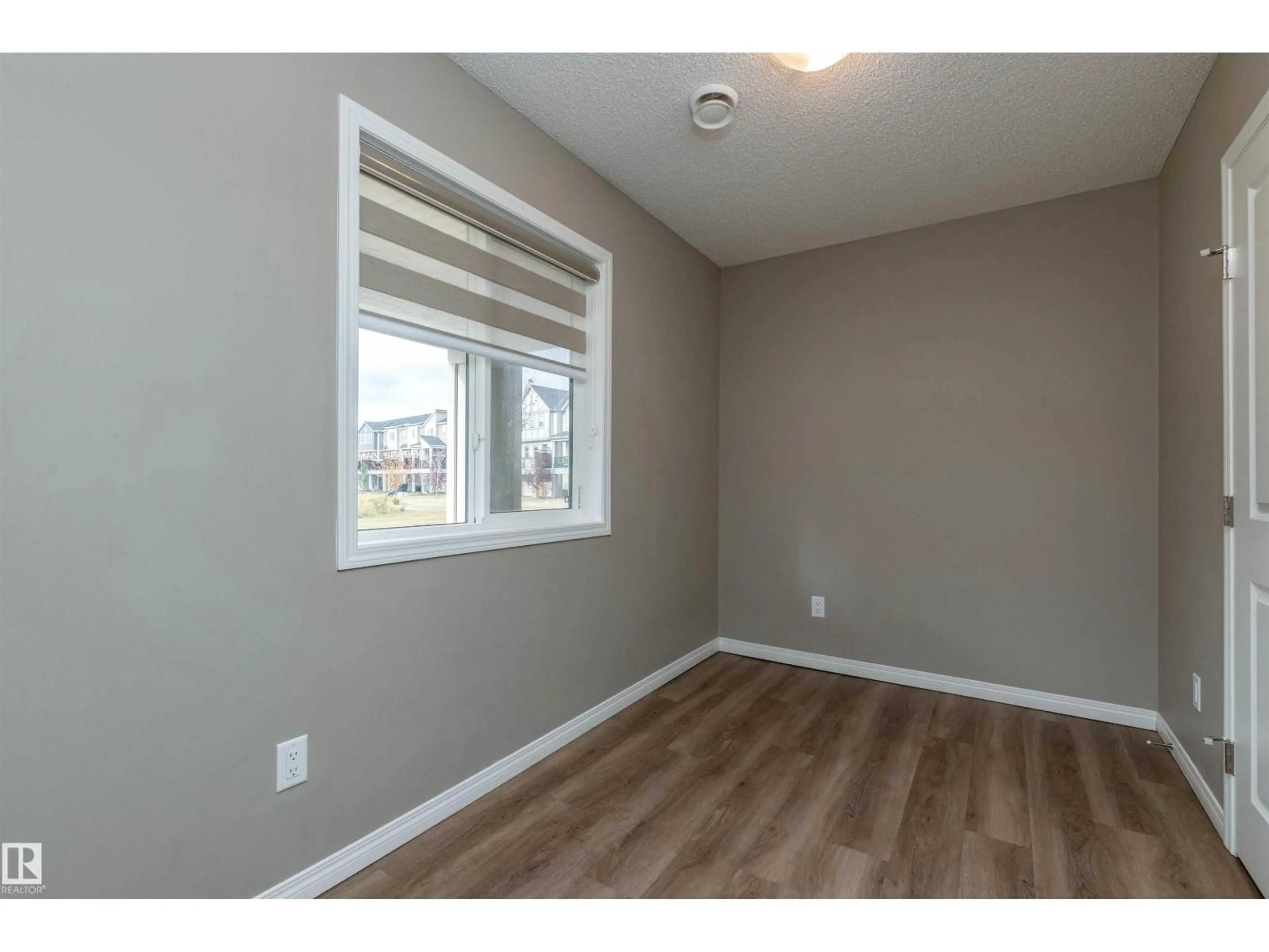 A pic of a room for #105 - 2072 WONNACOTT WY, Edmonton Alberta T6X2V7