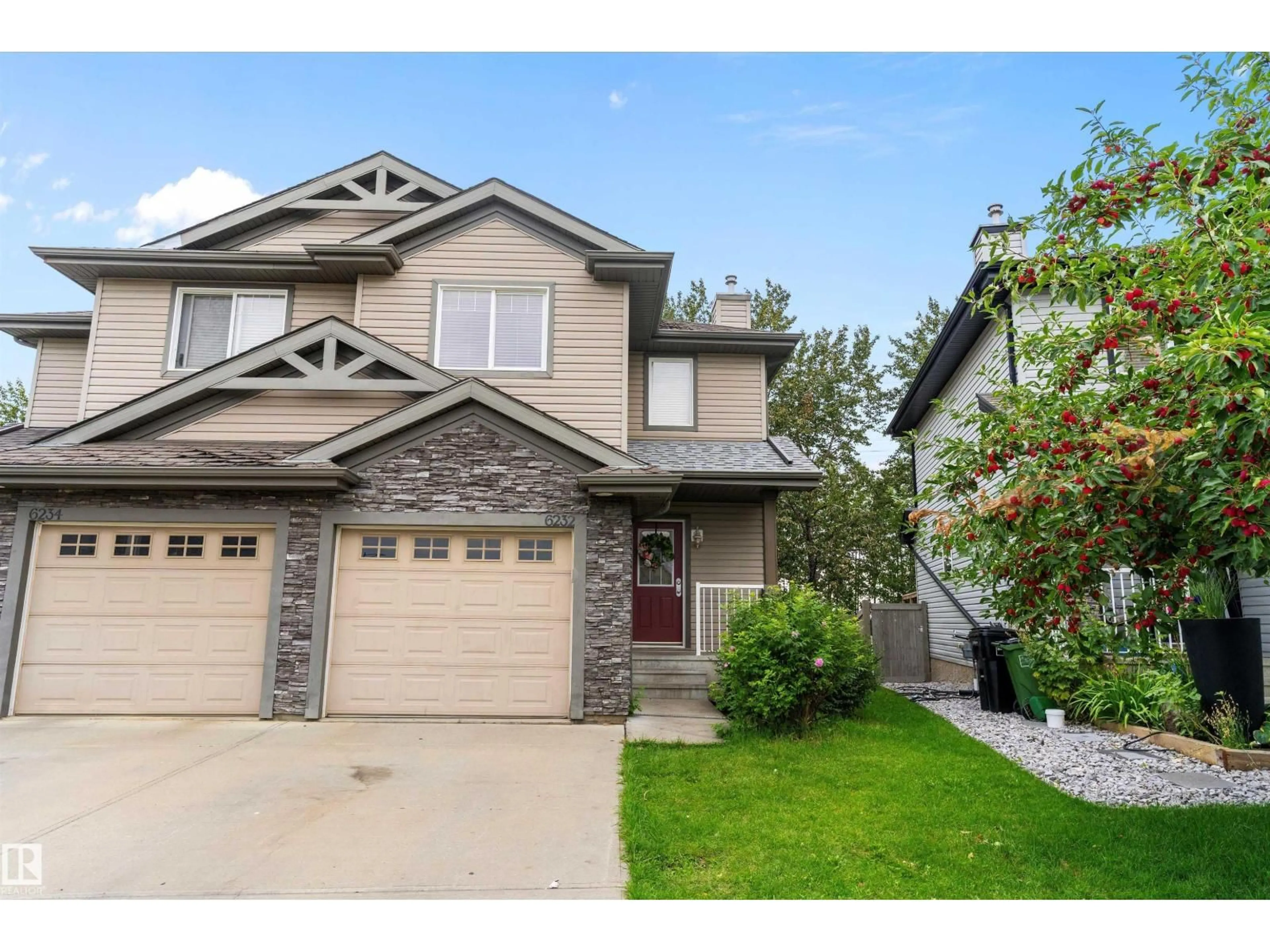 Home with vinyl exterior material, street for SW - 6232 1A AV, Edmonton Alberta T6X0C1