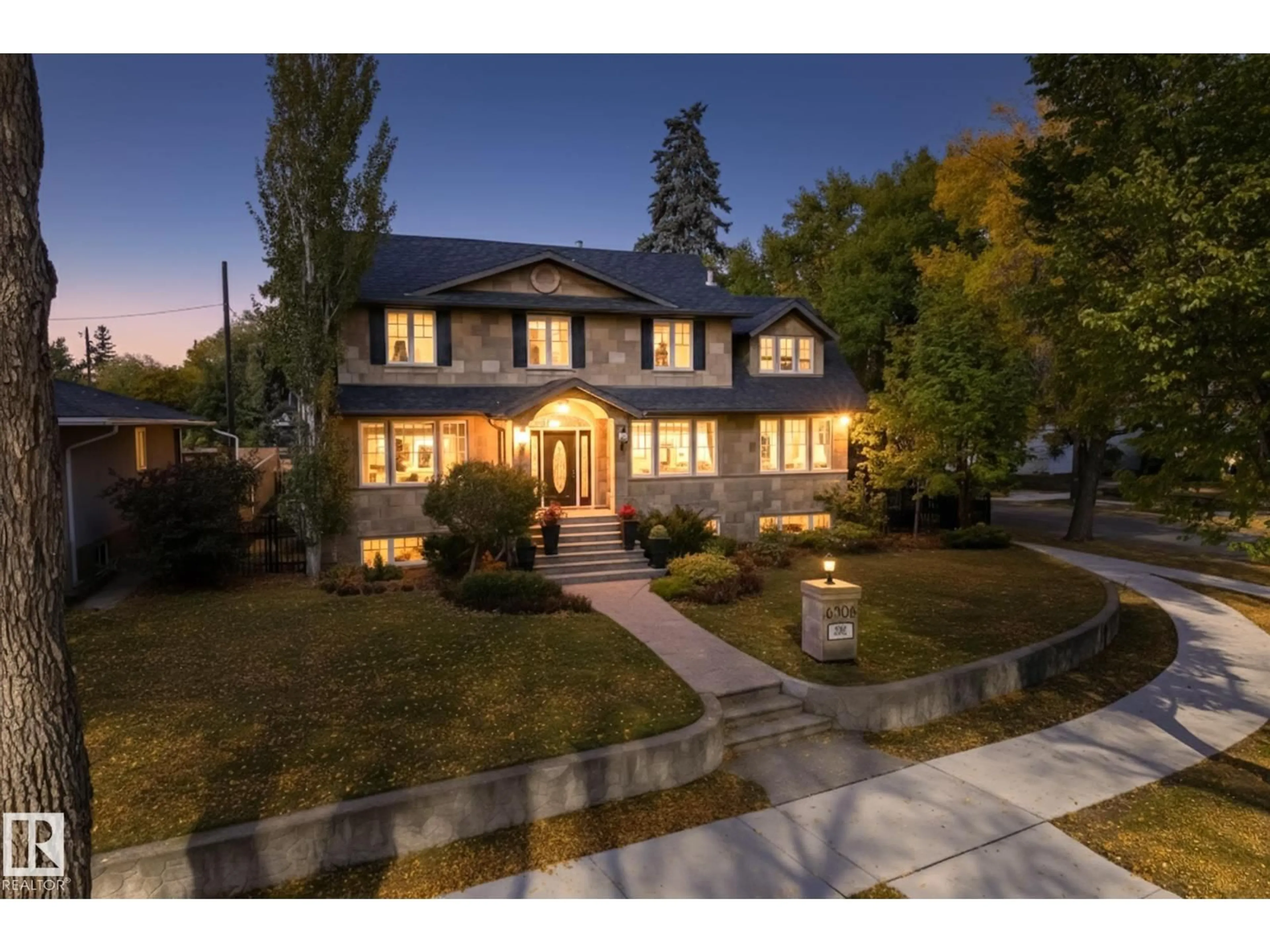 Home with brick exterior material, street for NW - 6306 111 AV, Edmonton Alberta T5W0L5