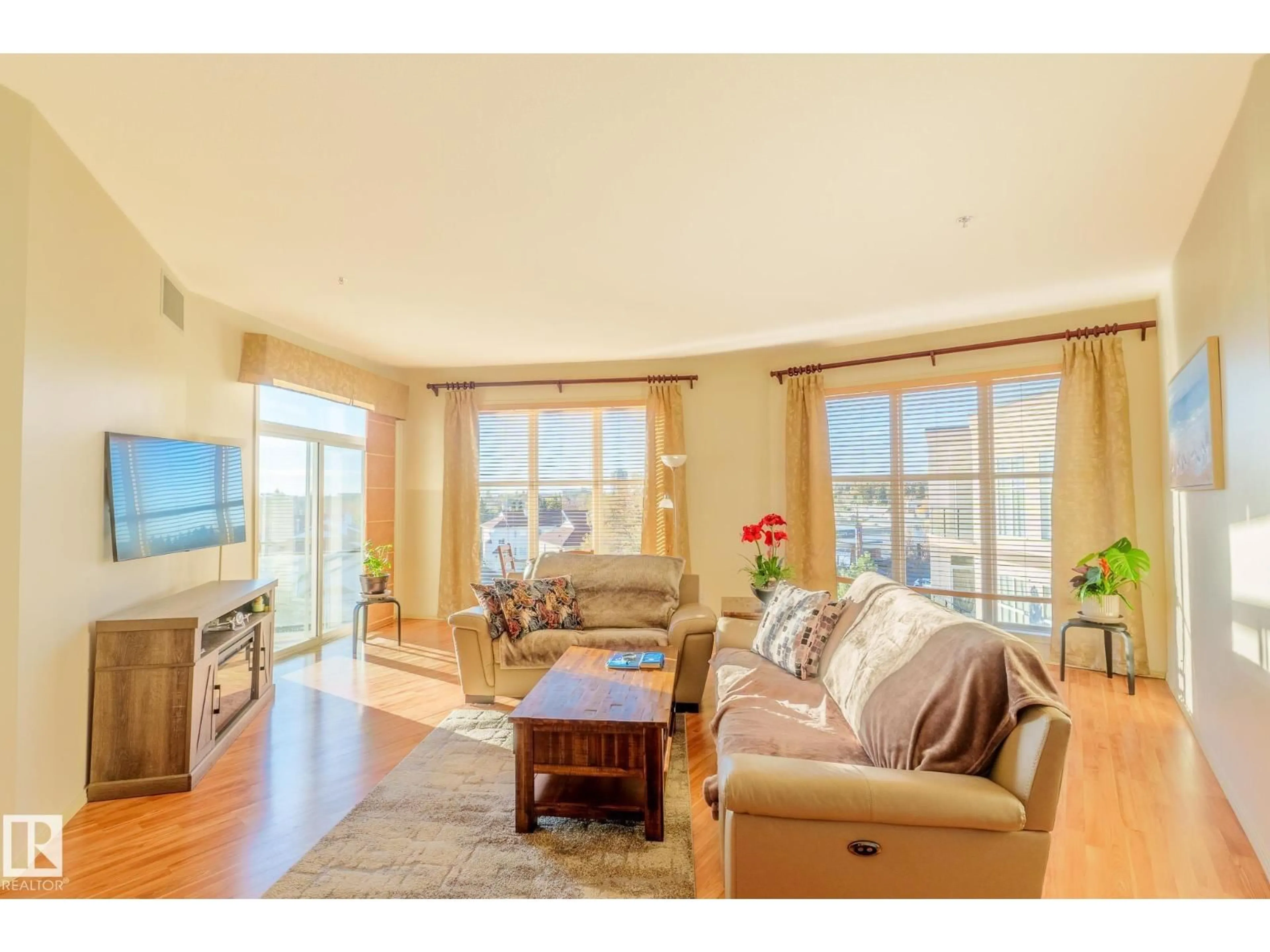Living room with furniture, wood/laminate floor for #449 - 4827 104A ST, Edmonton Alberta T6H0R5
