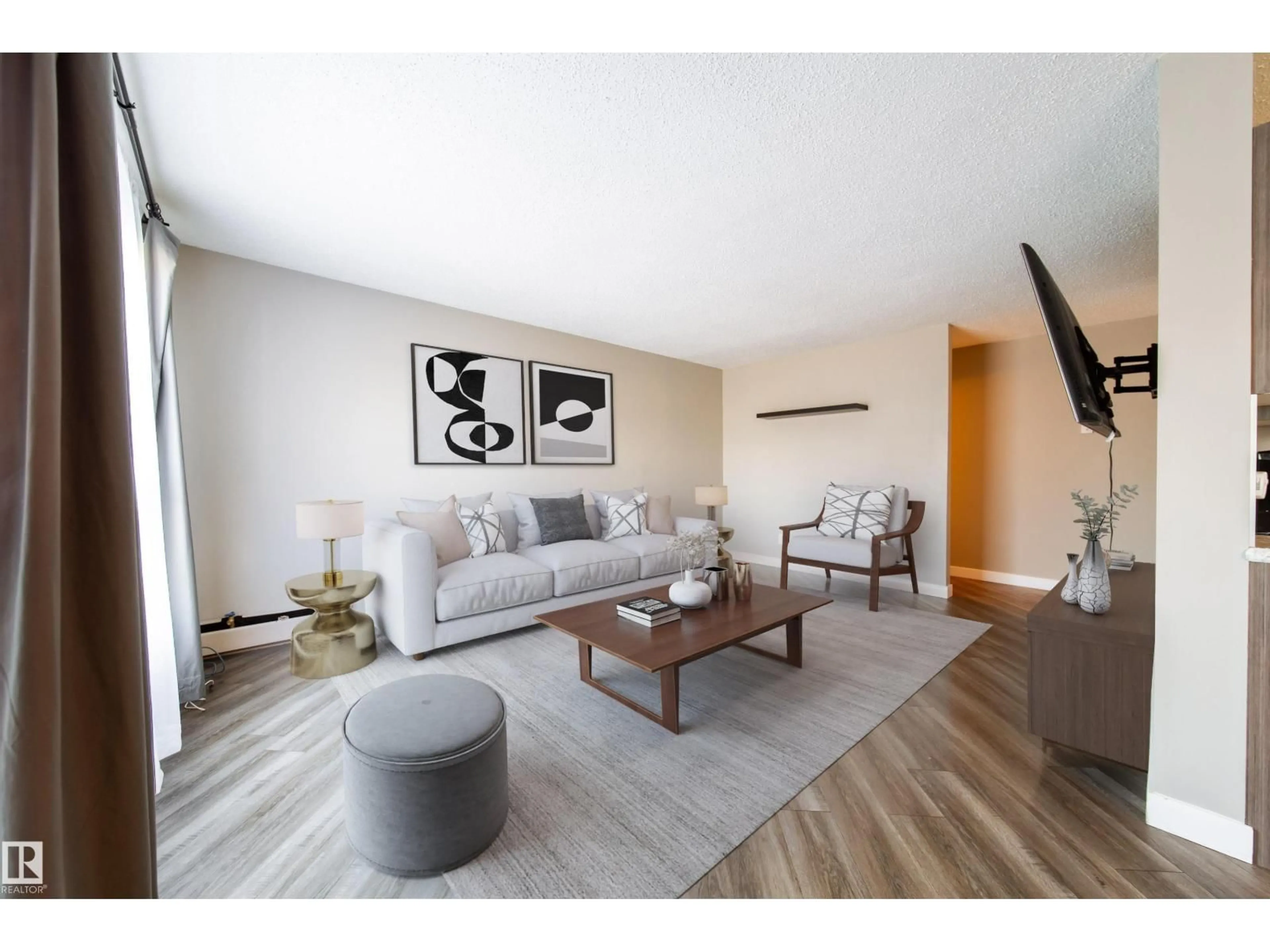 Living room with furniture, wood/laminate floor for #117 - 6103 35A AV, Edmonton Alberta T6L1G7
