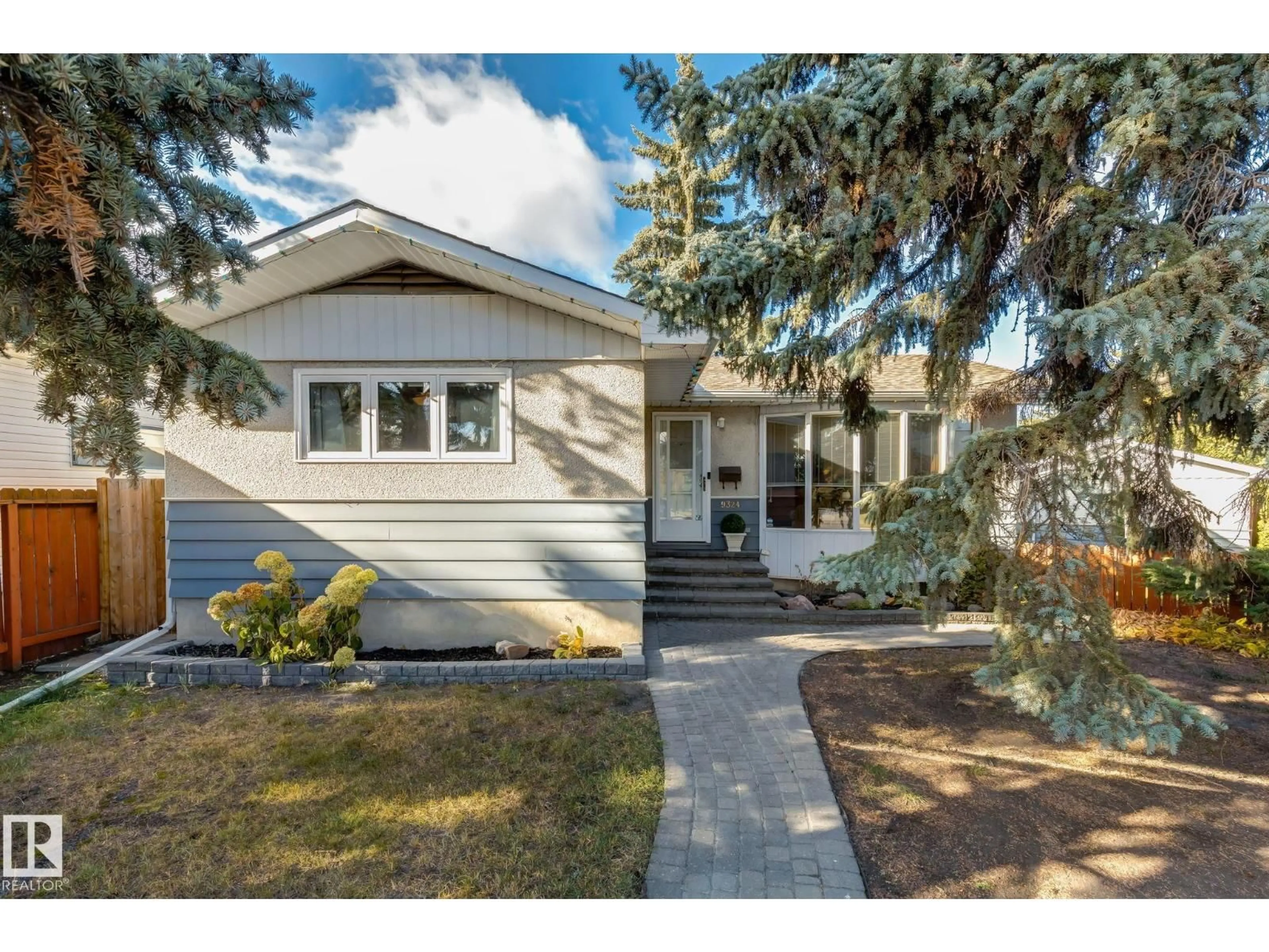 Home with vinyl exterior material, street for 9324 161 ST, Edmonton Alberta T5R2L4