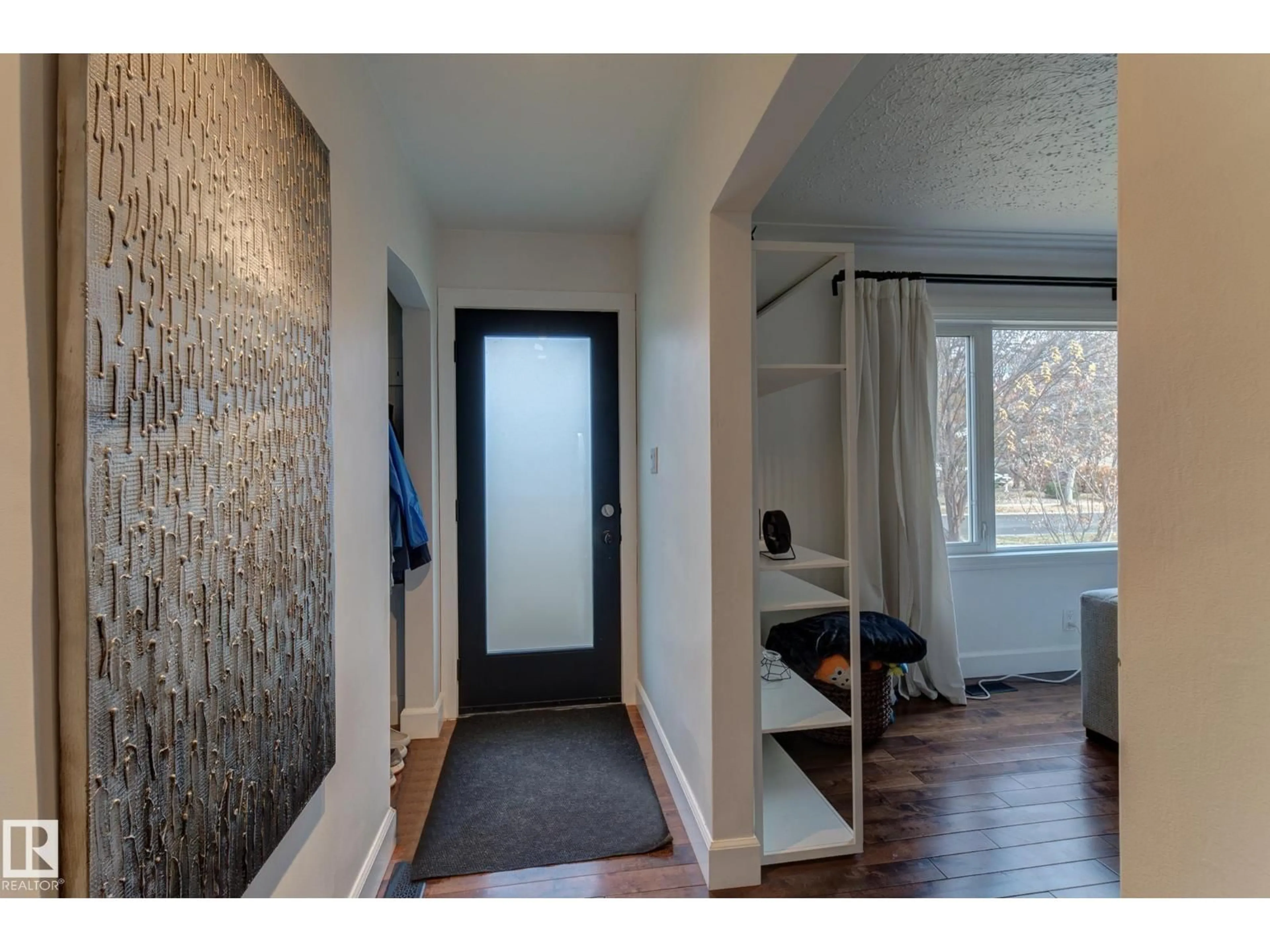 Indoor entryway for 13315 110 AV, Edmonton Alberta T5M2M1