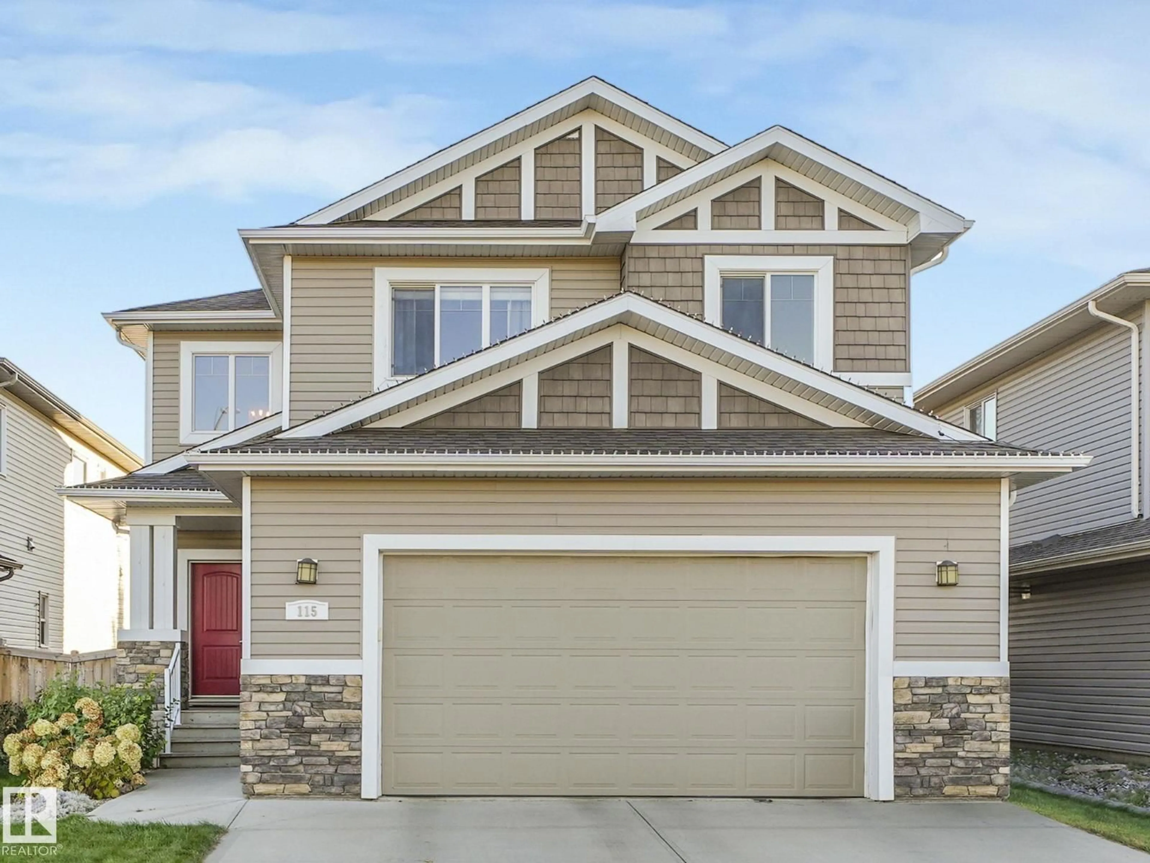 Home with vinyl exterior material, street for 115 HILLDOWNS DR, Spruce Grove Alberta T7X0J1