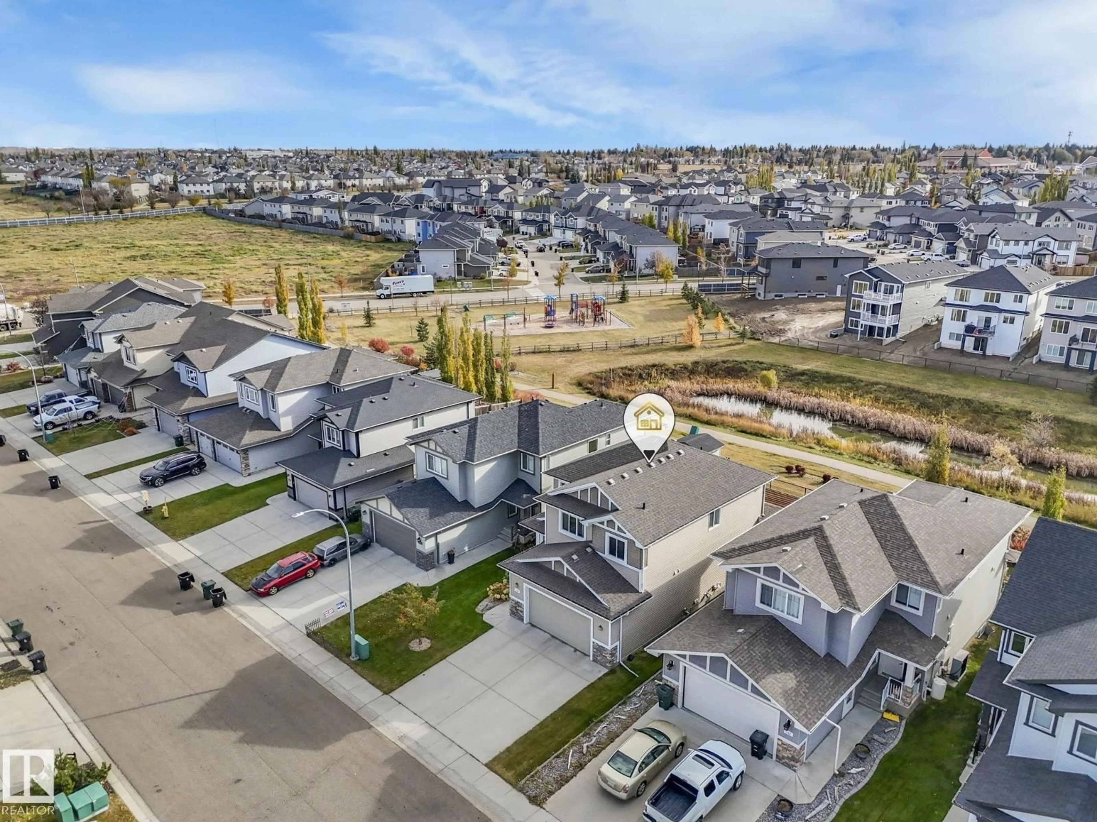 A pic from outside/outdoor area/front of a property/back of a property/a pic from drone, street for 115 HILLDOWNS DR, Spruce Grove Alberta T7X0J1