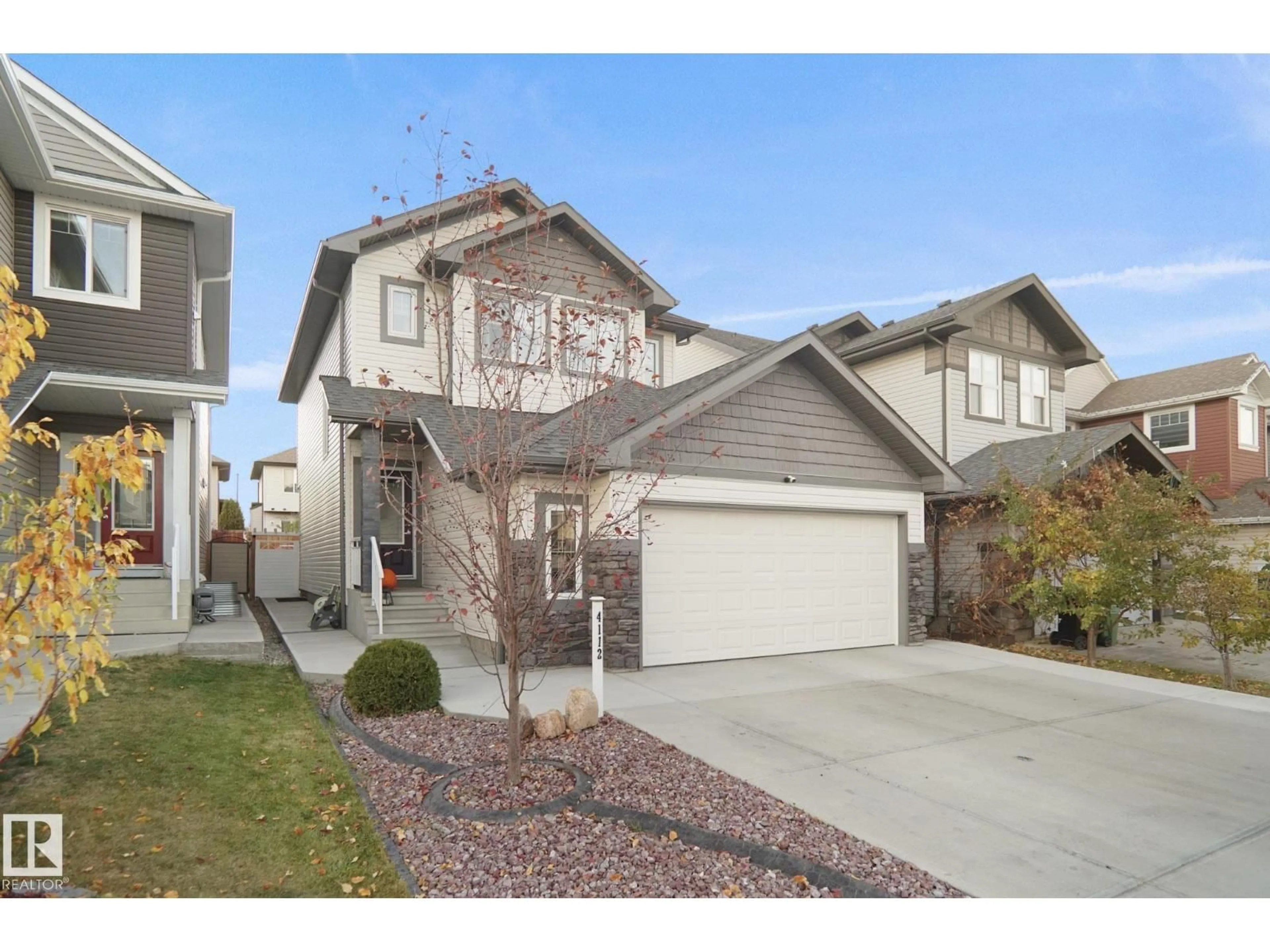Home with vinyl exterior material, street for 4112 171 AV, Edmonton Alberta T5Y0Z3