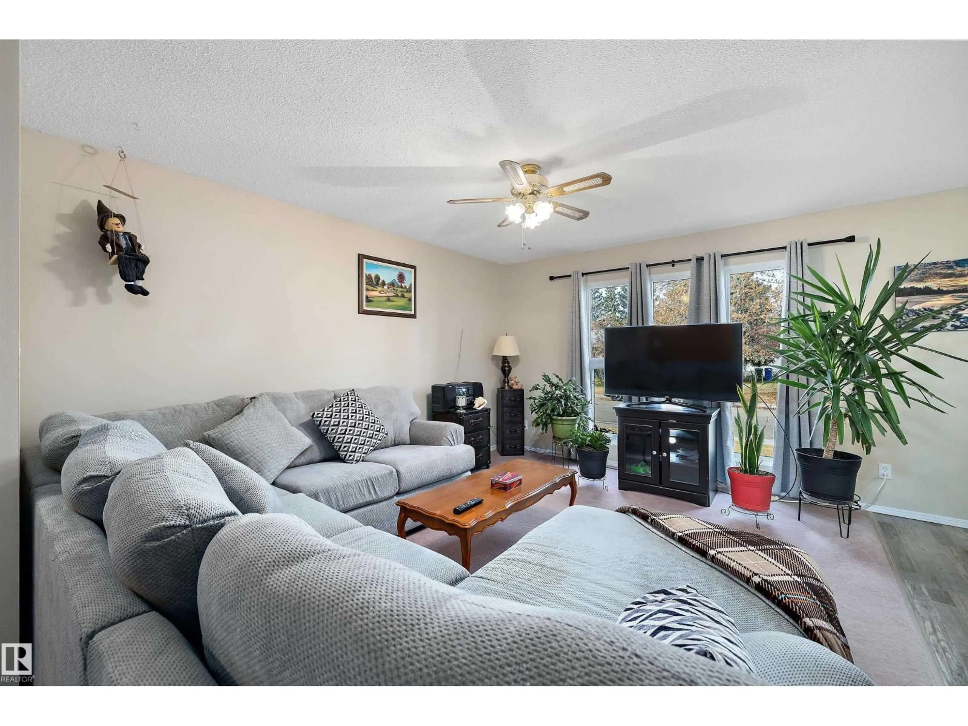 Living room with furniture, unknown for 113 ELM CR, Wetaskiwin Alberta T9A2C7