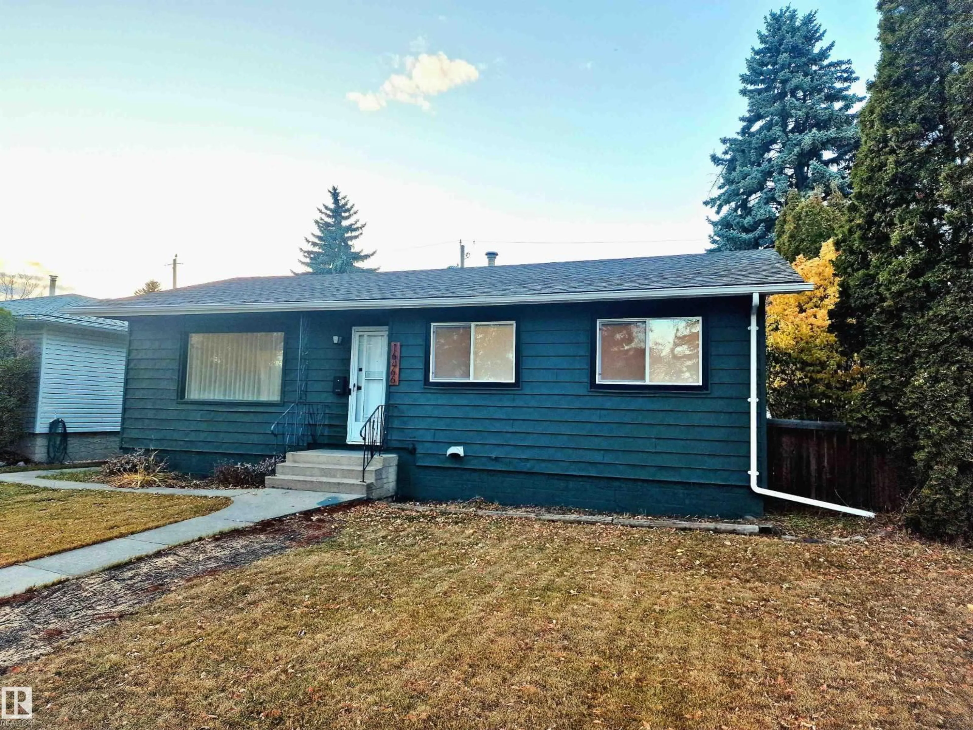 Home with vinyl exterior material, street for 16466 104A AV, Edmonton Alberta T5P0T4